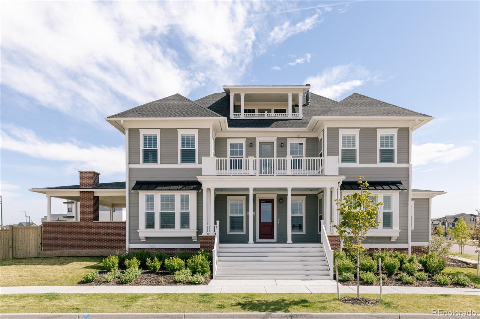 Set on one of the largest lots in Central Park at .30 acres, this Parkwood Southampton home offers an unparalleled living experience directly across from the breathtaking 15,000-acre Wildlife Refuge. Unobstructed views of open space & the Rocky Mountains from nearly every angle, this one-of-a-kind residence features multiple outdoor living spaces, 2 expansive west-facing balconies & a dramatic covered front porch. Inside, the home is designed for luxurious living, featuring a main floor primary suite with a soaking tub, custom tile shower, a spacious walk-in closet with custom organization—one pre-plumbed for a future washer/dryer—& designer finishes throughout. The main floor study offers a quiet work-from-home retreat, while the family room showcases custom built-ins & a stunning brick fireplace. The chef’s kitchen is a true centerpiece, complete with a 48” Wolf range, custom hood, waterfall-edge quartz countertops, built-in fridge, & striking two-toned black & wood cabinetry. Hardwood floors & designer tile flow throughout. Upstairs includes a guest suite with private bath, two additional bedrooms, a full bath & a large media area with built-in desks that opens to a second balcony with sweeping views. The third floor loft offers a powder bath, cozy fireplace & access to another outdoor deck. The finished basement includes a gym, recreation space, additional bed/full bath, wet-bar & storage. The backyard is built for entertaining with professional landscaping, an outdoor kitchen, fireplace, two gas lines & ample space to gather or unwind. Additional features include a 3-car garage, owned solar panels w/ battery &  rough-in plumbing, along with thoughtful whole-home upgrades such as an AprilAire humidifier & air purification system, a comprehensive water filtration system & a large tankless water heater with a recirculation pump for near-instant hot water. A rare opportunity to own a premier Central Park home near Pearl Market, dining, parks, trails & top schools.