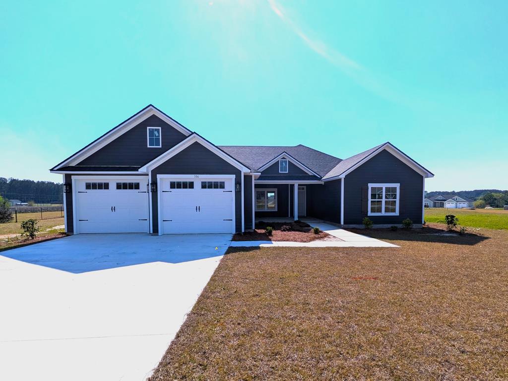 Brand new 4 bed/2 bath home located in the spectacular Southern Pointe subdivision! Ideally located, this home offers all the comforts of being close to town while still providing the space and privacy of the countryside. The front and back porches are the perfect areas to sit back, relax, and enjoy the breeze. This spacious .96 acre lot offers plenty of space for both kids and pets to run around and play. Inside the house, the soon to be impeccable kitchen is great for making meals while your kids or guests sit at the island countertop or in the living room. The trey ceiling in the living room and master bedroom gives the spaces a large and open feeling. You'll never feel claustrophobic here! The master bedroom comes with a gorgeous master bathroom that offers beautiful double vanities, a luxury shower, and a gigantic walk in closet. On the other side of the house, there are three more bedrooms which are perfect spaces for kids, an office, or for extended family when they come for a visit!