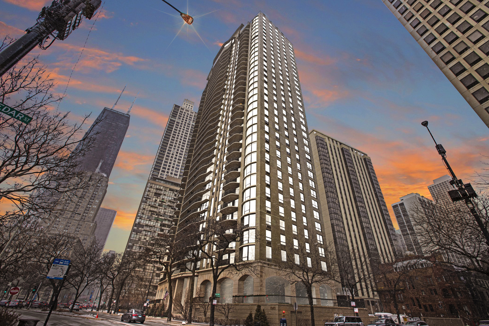 High floor east-facing unit with stunning sunrise views from expansive 32' balcony overlooking Oak Street Beach and Chicago's lakefront at 'The Carlyle', the Gold Coast's pre-eminent luxury full-amenity building.  Unit features hardwood flooring throughout with floor-to-ceiling windows, fabulous built-in bookshelves throughout the living room & formal dining room with views.  The eat-in kitchen features custom cabinetry, granite countertops, stainless steel appliances with ample cabinet and counter space, & Butler's Pantry w/wet bar.  Unit comprises two primary suites, each with a full bathroom and multiple closets.  Ample closet space throughout plus full-size stackable laundry in unit.  Building offers great privacy with only 2 units per floor.  Full-amenity building includes a newly renovated lobby, 24-hour doorstaff, fitness center, indoor lap pool, rooftop deck with grills, dry cleaning, ballroom, package delivery, valet parking, on-site maintenance & property management.  Steps to Michigan Avenue & Oak Street, this location is walkable to the most upscale shopping & fine dining options Chicago has to offer.  Accessible location is steps to bike path, beach, park, lakefront, and express bus transportation right outside your front door.  Enjoy everything that this world-class city has to offer.  Amazing unit & fabulous views in the best Chicago location!!!