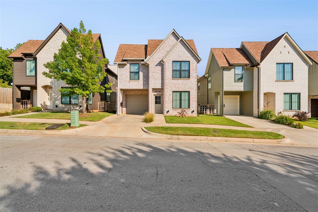 Located in one of Oklahoma City’s most sought-after neighborhoods—just a short stroll from the Plaza District’s shops, restaurants, and galleries—this modern residence offers thoughtful design and natural light throughout. Large windows and tall ceilings showcase a neutral palette and beautiful flooring. The open first floor flows seamlessly from a generous living area to a chef-ready kitchen with quartz countertops, custom tile backsplash, stainless appliances, ample cabinetry, a dedicated pantry, and a large island perfect for cooking and entertaining. Upstairs, the primary bedroom is a spacious suite with vaulted ceilings; the primary bath features double vanities and a walk-in closet that connects directly to the laundry room for ultimate convenience. Two additional bedrooms each include walk-in closets and share a Jack-and-Jill bathroom. Enjoy contemporary comfort and unbeatable walkability in the heart of OKC.