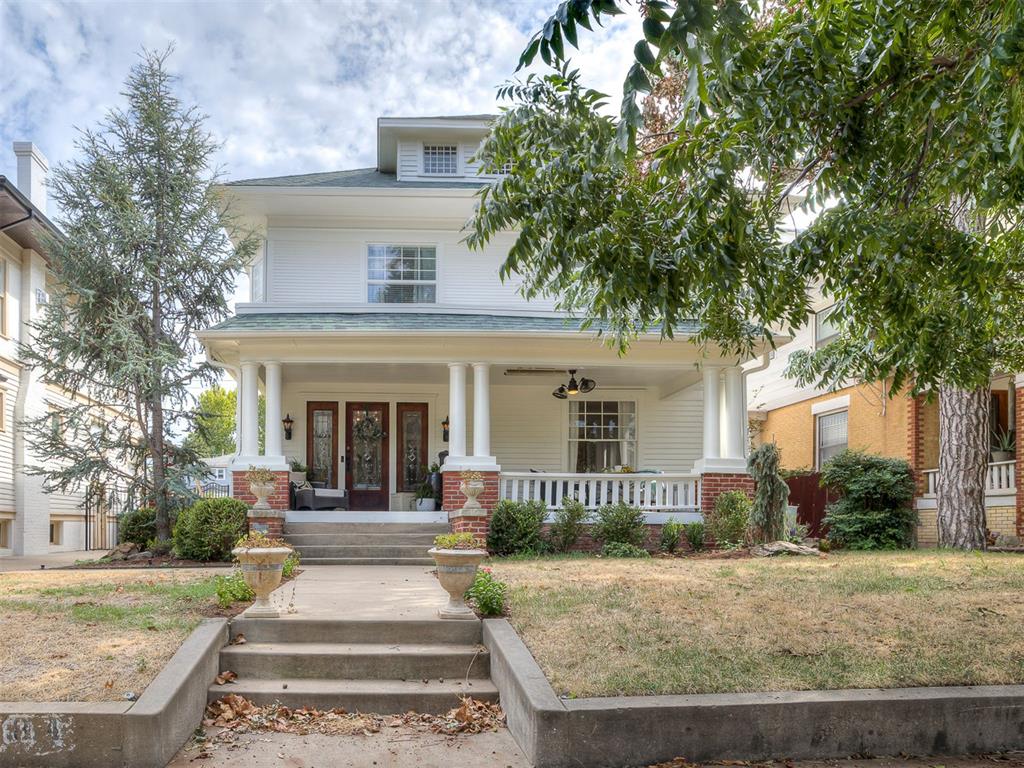 Experience classic 1907 charm seamlessly blended with modern luxury in this 5-bedroom, 3.5-bath Mesta Park home. Boasting 2 master suites, a custom-built library, a kitchen with exposed brick, and dining room pop-out doors for ultimate privacy and distinction. The property features two cozy gas fireplaces, extra high ceilings, and three fully custom closets for maximum comfort and organization. The grand exterior of this three story home has new siding, clean gutters, custom wood windows by Restore, and has fresh top-to-bottom paint. You’ll enjoy dining on the wood planked porch under the ceiling fan or heater while enjoying the fully landscaped front lawn with sprinklers and shade trees. The backyard boasts a new wood deck, new fencing and gate, HP-approved plans for a full-size pool, and rare, convenient two-car garage with alley access. The basement and foundation are dry, fully functional for storage and with no structural issues. The roof was installed August 2024.