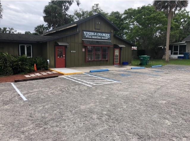 Full Service Hair/Nails/Beauty - excellent location - improved parking - in use commercial building with rental house also included.