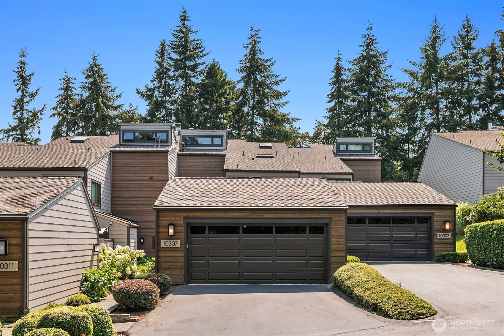 Prime Downtown Bellevue location! Beautifully new remodeled 2 bedrooms, 2,303 SF Milestone townhome offering bright south-facing living spaces, gas fireplace, elegant dining room & inviting family room. Sliding doors open to a private, charming courtyard—perfect for relaxing or entertaining. Spacious primary suite features a sitting area & sunroom. Versatile upstairs bonus room for office, media or play. Abundant storage, private 2-car garage & beautifully maintained grounds. Clyde Hill Elementary!!!