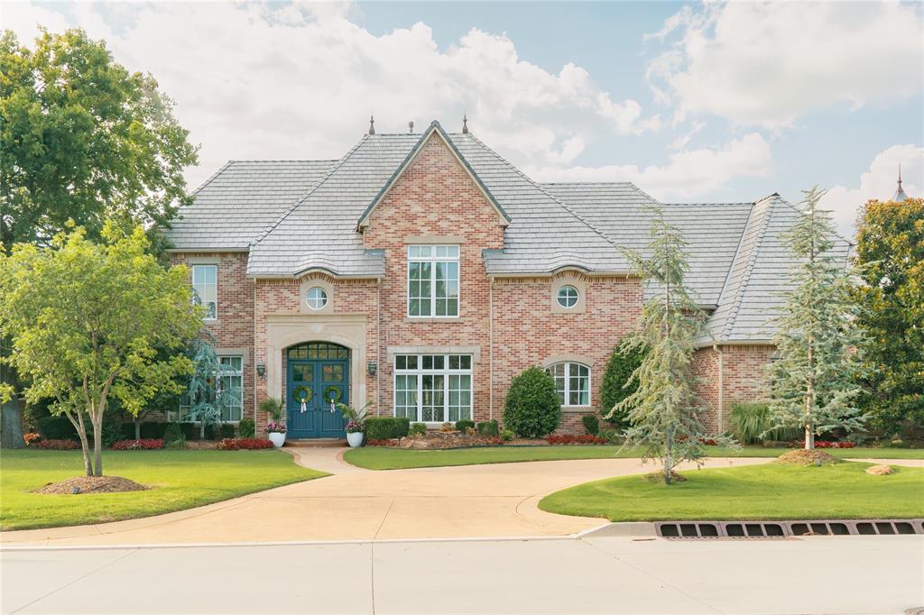Welcome to refined luxury in Ashton Grove, Norman’s premier gated community. Set on an oversized corner lot, this stunning 5,234-square-foot estate blends timeless architecture, sophisticated updates, and exceptional indoor-outdoor living. Enjoy scenic views of the community pond and walking trails, all just minutes from Norman’s most sought-after amenities.A dramatic two-story entry opens to a breathtaking vaulted living room anchored by one of two elegant cast stone fireplaces. At the heart of the home, the fully remodeled kitchen (2020) impresses with a 48" professional Wolf range with double ovens and six burners, plus a spacious walk-in pantry. Multiple living and dining spaces provide flexibility for intimate evenings, formal gatherings, and everything in-between.A private study with custom built-ins creates a beautifully appointed work-from-home retreat, while the versatile media and flex room is ideal for movie nights, a playroom, fitness space, or creative pursuits. Four spacious bedrooms and five-and-a-half baths provide comfort and privacy for family and guests.Step outside to your own private resort. The beautiful pool with diving board and hot tub offers the perfect setting for summer afternoons and unforgettable gatherings. A built-in fire pit and grill extend the entertaining space, creating an inviting atmosphere for relaxed evenings under an Oklahoma sunset.Additional highlights include a three-car garage, storm shelter, central audio system, custom drapery, and a DaVinci Class 4 roof.From its impressive architecture and beautifully updated interiors to its exceptional outdoor amenities and coveted gated-community setting, this Ashton Grove estate offers a rare combination of luxury, comfort, privacy, and effortless entertaining—a truly exceptional place to gather, unwind, and enjoy the best of Norman living.