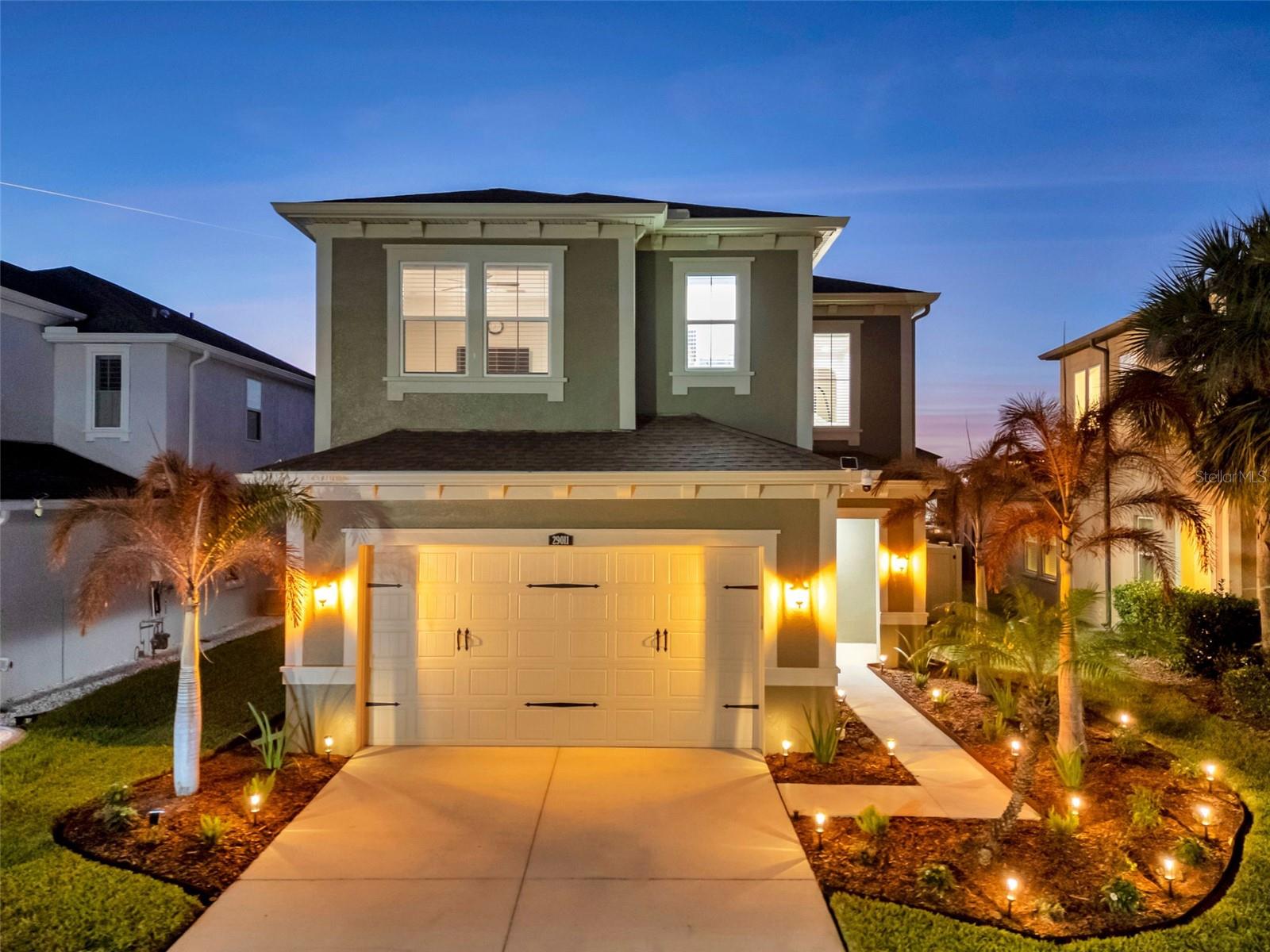 Welcome to Estancia at Wiregrass Ranch’s newest showstopper, located in the highly sought-after Savona section. Built in 2017 by Cal Atlantic, this stunning Milan floor plan offers just under 2,500 square feet of beautifully designed living space with absolutely no wasted square footage.This four bedroom, three bathroom home with a spacious loft is absolutely dripping in upgrades from the moment you arrive.The heart of the home is the fully upgraded gourmet kitchen, designed for both beauty and function. Featuring a 36-inch gas cooktop, wall-mounted chef’s range hood, upgraded appliances, gorgeous quartz countertops, and top-of-the-line cabinetry, this space was made for entertaining and everyday luxury. The open layout flows seamlessly into the main living areas, creating a bright and inviting atmosphere.Luxury vinyl plank flooring runs throughout the home, giving it a cohesive, modern feel. Thoughtful details continue with the etched glass pantry door, upgraded French closet doors, and elevated finishes throughout.Step outside and prepare to fall in love. Situated on one of the nicest pond lots in the community, this home offers stunning sunset views that paint the sky each evening. The backyard features upgraded vinyl fencing for privacy, enhanced professional landscaping that adds both curb appeal and character, and an extended paver lanai with a large screened enclosure — perfect for relaxing or entertaining year-round.Additional improvements include a whole-home water softener with reverse osmosis system, new 8-foot front door, epoxy-coated garage floor, WiFi belt-driven garage door opener, replaced sprinkler pop-ups, A/C UV lighting system, and fresh exterior paint completed in April 2025.Living in Estancia at Wiregrass Ranch means being part of a vibrant resort-style community with world-class amenities including lushly landscaped parks, scenic walking trails, and a resort-style clubhouse and pool—perfect for relaxation and recreation. Conveniently located near The Shops at Wiregrass, AdventHealth Wesley Chapel, I-75, and top-rated schools, this location offers an unmatched combination of elegance and accessibility. Don’t miss this rare opportunity to own a turnkey home in one of Wesley Chapel’s most desirable gated communities. Schedule your private showing today and experience what its like to be an Estancia resident! **ASK ABOUT OUR PREFERRED LENDER INCENTIVES & OUR OTHER PROMOS!**