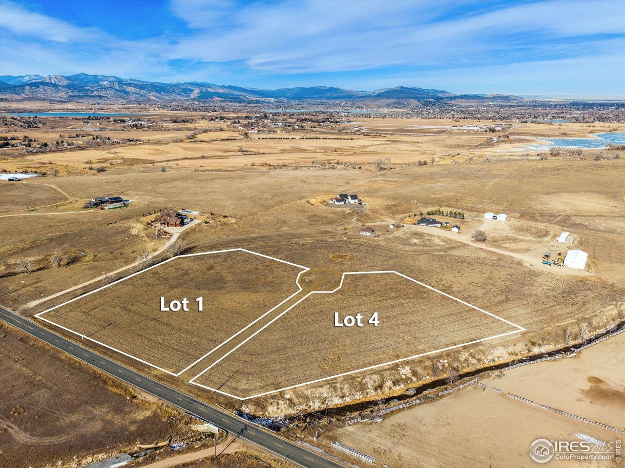 Welcome to Lot 4 in the Novak Subdivision-an exceptional 4.29-acre parcel offering the perfect canvas for your custom dream home. Nestled in a serene rural setting with panoramic views of snow-capped peaks and open skies, this homesite combines tranquility with convenience. Located minutes from TPC at Heron Lakes, Berthoud, and Loveland, you'll enjoy easy access to world-class golf, dining, and recreation. The land features gentle topography ideal for building, with room for outbuildings, gardens, or equestrian use. Whether you're envisioning a modern farmhouse, mountain retreat, or luxury estate, this lot delivers space, scenery, and lifestyle.