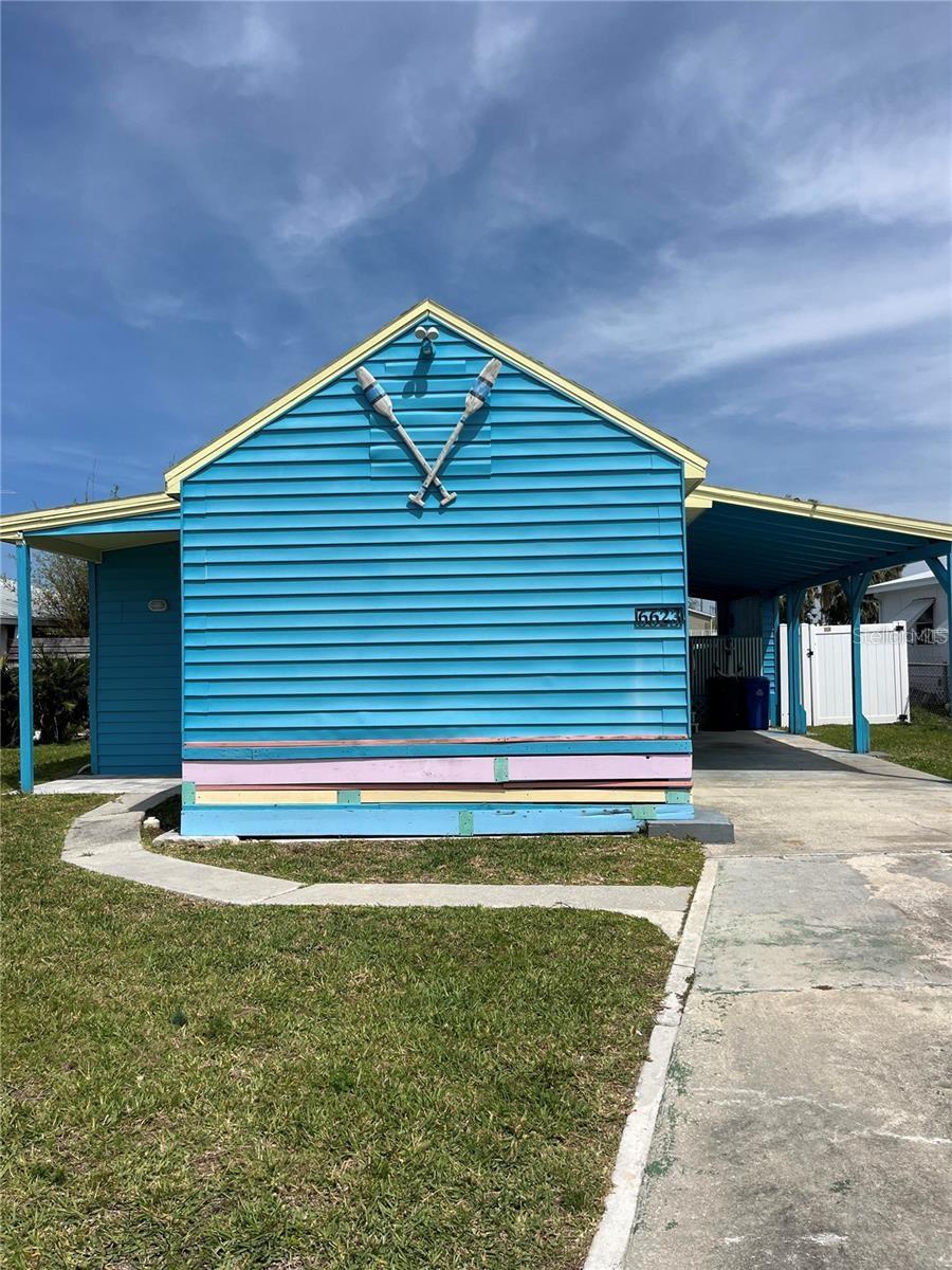 Turnkey Waterfront Retreat in Hudson, FL – Fully Furnished & Proven Income Producer | No HOA. Welcome to this beautifully renovated waterfront cottage offering true Florida coastal living with direct Gulf access just minutes away. Sold fully furnished and currently operating as a successful short-term rental, this property is truly turnkey—ideal for investors or those seeking a personal waterfront escape. Enjoy the outdoors with two floating docks, a fish cleaning station, and a fully fenced backyard featuring a new vinyl fence (2022)—perfect for boating, fishing, kayaking, and taking in unforgettable sunset views. Inside, the home showcases modern coastal upgrades throughout, including luxury vinyl plank flooring, recessed lighting, and a stunning remodeled kitchen with granite countertops, LG stainless steel appliances (2022), and Bluetooth-enabled extractor fans. The spa-inspired bathroom features mother-of-pearl tile accents and sleek stainless-steel fixtures. The spacious primary suite offers soaring ceilings, a custom California Closets system, and a stylish barn door divider, creating both function and charm. Major improvements completed between 2021–2022 include a new A/C system and ductwork, updated plumbing and electrical, new windows, and fresh exterior paint, providing peace of mind for years to come. With no HOA, strong rental history, and move-in-ready condition, this waterfront gem presents an exceptional opportunity to own a slice of Florida paradise!