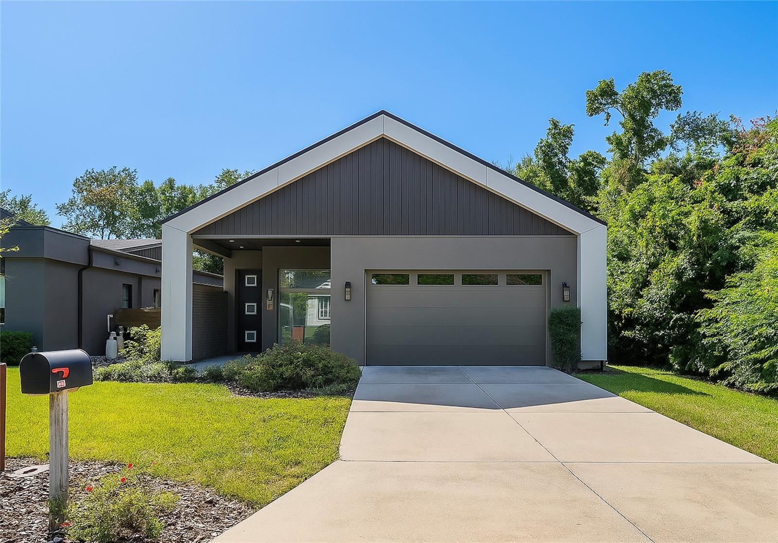 Luxury meets lifestyle with this modern masterpiece built in 2021. Step inside this custom built 3 bedroom, 2.5 bath contemporary home offering 2,145 sqft. of exceptional design and craftsmanship. From the moment you enter, you’ll be captivated by the soaring ceilings, natural light from skylights, and sleek open-concept layout that define modern elegance. Every detail has been curated for both style and comfort, setting this home apart from the typical new construction. The chef’s kitchen is a true showstopper, featuring premium appliances, designer cabinetry, and a statement island ideal for hosting family and friends. The spacious living and dining areas seamlessly extend outdoors to a covered lanai with a remote-controlled screen, creating the perfect flow for indoor-outdoor living. Throughout the home, tall 8-foot interior doors enhance the sense of space and sophistication, creating a grand, airy atmosphere that perfectly complements the home’s modern design. Retreat to the luxurious primary suite complete with a Closets by Design custom walk-in, spa-inspired ensuite, and plantation shutters that blend privacy with sophistication. The two additional bedrooms are generously sized and connected by a beautifully designed Jack & Jill bath, offering the perfect setup for family, guests, or a flexible home office or gym space. Thoughtful upgrades throughout include remote-controlled interior blinds, a large custom laundry room, and a fully equipped EV charging station in the garage, bringing modern convenience to your everyday life. Outside, enjoy a private, fenced backyard ideal for relaxing or entertaining under the Florida sun. With smart-home features, luxury finishes, and distinctive architectural details, this residence offers the perfect combination of contemporary flair and everyday functionality. Perfectly positioned near I-4 for easy access to Downtown Orlando, Winter Park, and beyond, and zoned for A rated Boone High School, this home delivers luxury living with everyday convenience. Homes like this rarely come to market, schedule your private showing today before it’s gone.