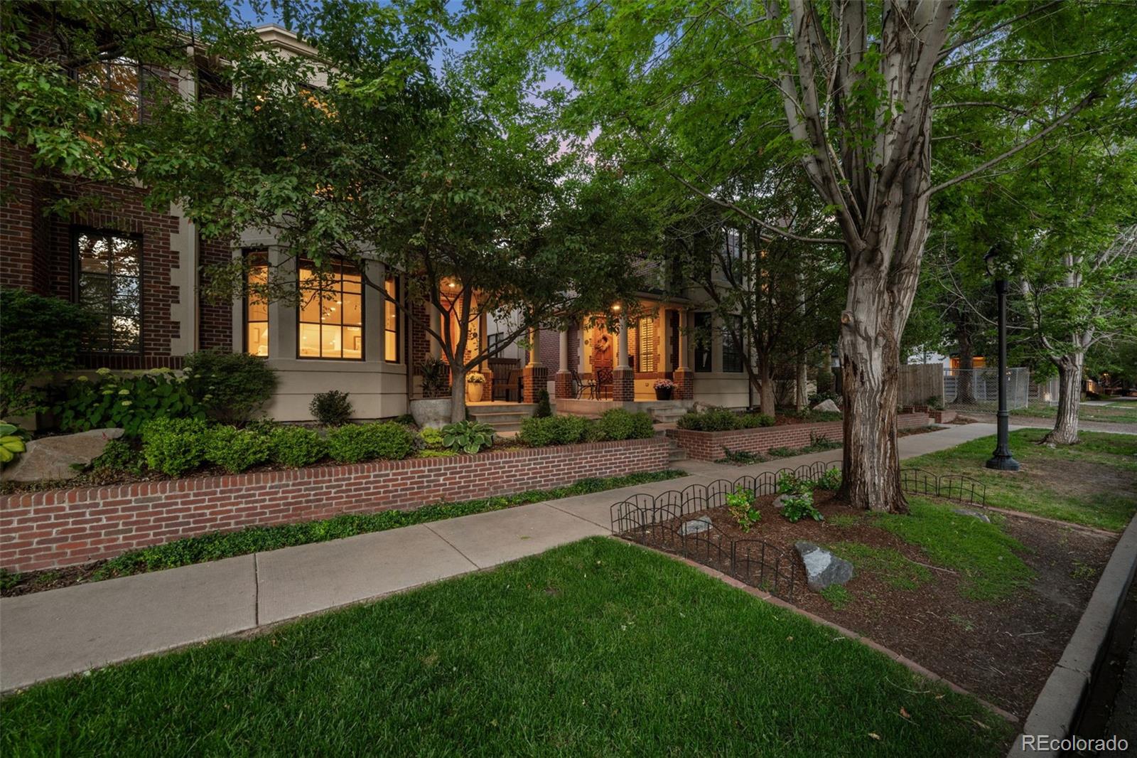 Walk to Cherry Creek. Bike to Washington Park. Minutes to Downtown. Welcome to a location that defines Denver living.Perfectly positioned in one of Denver's most coveted neighborhoods, this sophisticated residence combines timeless design, thoughtful updates, and an unmatched urban lifestyle. Expansive ceilings and walls of glass create a bright, airy feel, bathing the home in natural light and enhancing the sense of space throughout.At the heart of the home, the beautifully updated kitchen is designed for both everyday living and effortless entertaining, featuring stylish finishes, generous prep space, and a seamless connection to the main living areas. The inviting great room offers a comfortable gathering space centered around a striking fireplace and framed by abundant natural light.The primary suite provides a peaceful escape, complete with a private outdoor connection, cozy fireplace, luxurious bath, and an impressive dressing area. The  secondary bedroom enjoys its own private bath, offering comfort and flexibility for guests, family members, or those working from home.The finished lower level adds valuable living space with a temperature-controlled wine room and endless possibilities for recreation, entertaining, fitness, or media enjoyment.Outdoor living is equally impressive. A secluded courtyard creates a private oasis rarely found in the city, anchored by a beautiful fireplace that invites year-round enjoyment and memorable evenings with family and friends.Just moments from Cherry Creek's renowned boutiques and restaurants, Washington Park, the Cherry Creek Trail, and Downtown Denver, this is more than a home—it's an opportunity to enjoy one of Denver's most desirable and connected lifestyles