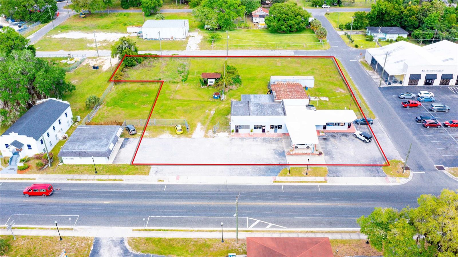 Prime Downtown Dade City Investment & Leasing Opportunity. Situated in the heart of historic Downtown Dade City, this 1.15-acre parcel offers unmatched visibility and access, with street frontage on three sides and an impressive 200 feet along bustling 7th Street.
The property features a 3,103 SF retail building, currently home to two established tenants, providing steady income. In addition, two units (with potential for a third) are available for lease, making this an ideal opportunity for investors seeking both immediate cash flow and future upside through lease-up potential.  With its strategic location, ample street exposure, and rare parcel size for downtown, this property is well-suited for retail, restaurant, office, or mixed-use concepts. The surrounding area continues to thrive with strong foot traffic, local businesses, and community events that make Dade City a regional draw.
