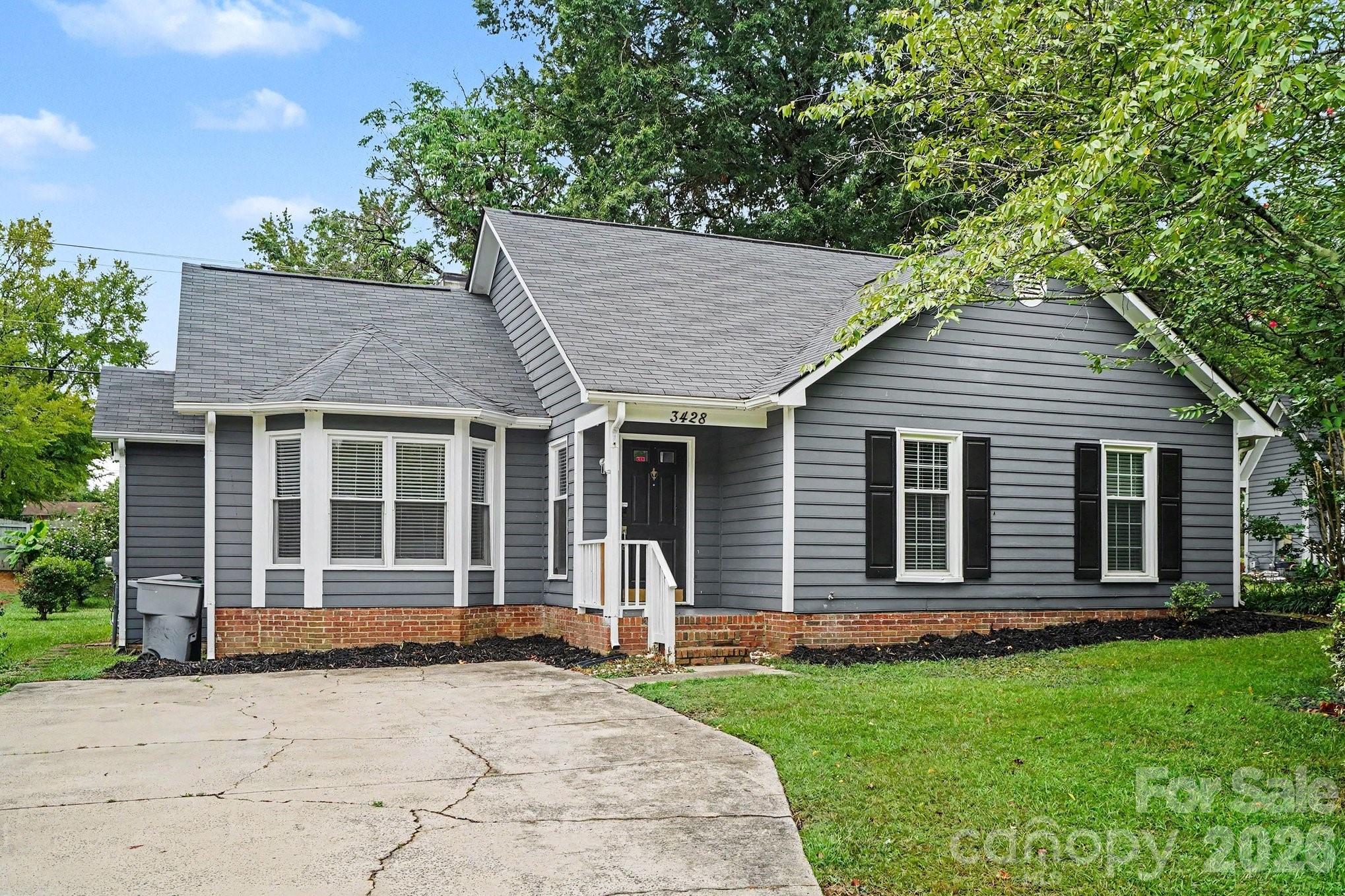 Welcome to this 3-bedroom, 2-bathroom home in the Glenwood Manor neighborhood. This home features a classic, traditional floor plan that provides dedicated spaces for both relaxing and entertaining. The inviting living room is centered around a cozy fireplace, while the kitchen comes equipped with solid surface countertops and a stylish mix of black and stainless-steel appliances. The primary bedroom offers great storage with a large walk-in closet. Conveniently located with easy access to Highway 74 and I-485, the home is just minutes from shopping, dining, and everyday amenities. Schedule your private showing today!