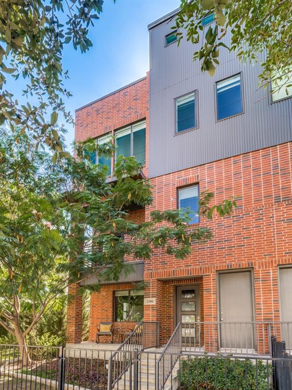 Stunning three-story townhome in sought after Linwood, steps from the energy of West 7th Street. Step up to the rooftop deck, where a full outdoor kitchen with grill, sink, and refrigerator faces unobstructed views of the downtown Fort Worth skyline.Inside, the open main level is made for entertaining, with a large living area and a chef friendly kitchen featuring granite countertops, abundant cabinetry, stainless steel appliances, and a gas cooktop. Engineered hardwood runs through the main living areas, and a half bath sits conveniently on this level.Upstairs, the primary suite features a bath with an over sized walk in shower, and the third bedroom has its own en suite bath with a tub. The lower level offers a bedroom with a full bath, flexible as a guest suite or office.Enjoy a two car garage, a gated yard, solar panels that convey with the home, and no HOA. Walk to dining, shopping, and nightlife on West 7th Street.