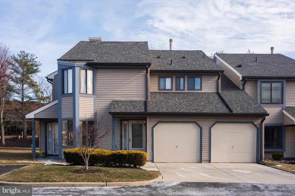 Move right in to the perfect 1st Floor, end-unit condo with a garage in desirable Country Squires! This property has been meticulously maintained and features upgraded flooring throughout, newer appliances, windows, and HVAC systems - the furnace, AC, and water heater have all be updated. The master bedroom includes a spacious walk-in closet & master bathroom. Also featured is a complete home water filtration system. This home is is situated in a quiet development yet close to major shopping outlets and dining and easily accessible from 295/95/NJ turnpike.