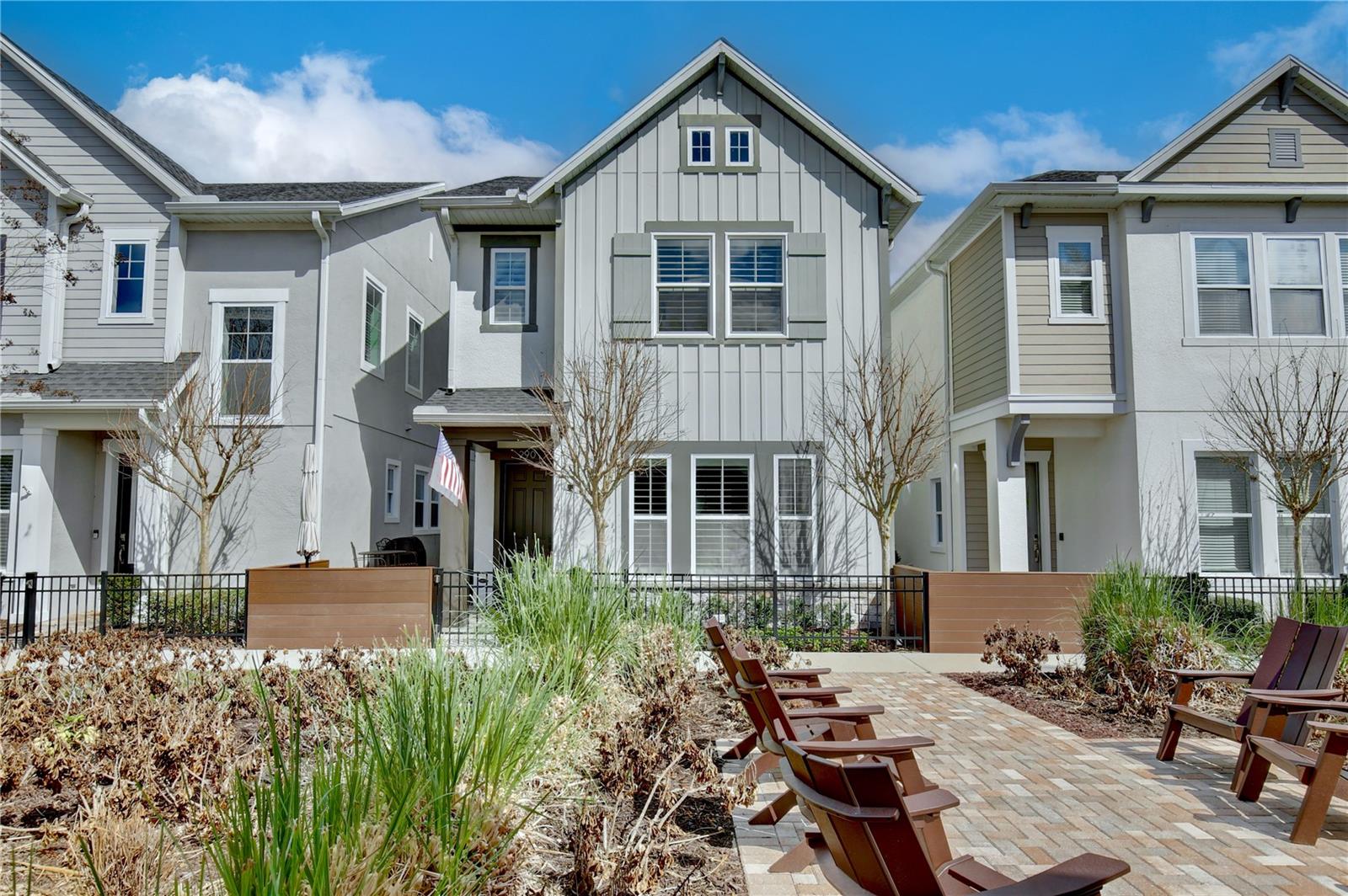 Welcome to 290 Viola Cove, a beautifully upgraded and truly move-in ready single-family home located in Lake Mary’s highly sought-after Griffin Park. This 4-bedroom, 2.5-bath home is filled with thoughtful upgrades and modern touches, making it a standout in a neighborhood known for its charm and convenience. The beautifully updated kitchen features under-cabinet lighting, ceiling-height cabinetry, a glass tile backsplash, upgraded Corian countertops, and a spacious island with a farmhouse sink and seating area. The kitchen has also been recently refreshed with a brand new refrigerator, oven (with air fryer!), dishwasher, and garbage disposal. Cook with ease on the natural gas range, complemented by natural gas-powered hot water, and enjoy added convenience with a utility sink in the garage. Organization was clearly top of mind in this space, with pull-out cabinetry for easy storage and clever details throughout—including a built-in spice rack on the inside of the pantry door. The downstairs powder bath was recently updated with chic wallpaper and a new mirror, creating a stylish space for guests during gatherings. Additional updates throughout the home include TOTO toilets, an epoxy garage floor, lush Florida-friendly landscaping in both the front and back yards, a newly carpeted stairway for comfort and safety, plantation shutters in the stairwell, upgraded faucets in the primary bathroom suite, and custom built-in closet systems in all four bedroom closets, including the primary walk-in closet. Throughout the home you’ll find Mohawk laminate and tile flooring—no carpet—along with elegant plantation shutters and excellent storage options. The spacious primary suite features a stunning tray ceiling and a spa-like bathroom with dual vanities, a walk-in shower, private water closet, and generous closet space. Outdoors, a large paver patio offers the perfect place to relax or entertain. The functional driveway (yes—you are allowed to park in it!) is a rare and practical feature in this neighborhood.Located within Seminole County’s top-rated school district, the home is just 10–15 steps from Griffin Park’s sparkling community pool and within walking distance of a vibrant shopping area filled with boutiques, restaurants, and more. The gated community also provides added peace of mind. With tasteful tones, extensive upgrades, and designer-quality finishes throughout, this home is truly a must-see. Schedule your private tour today!