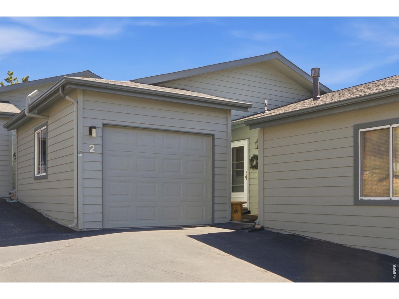 There are mountain homes you visit once, and then there are the ones that quietly become "your place." This Northridge Meadows condo offers that kind of Estes Park opportunity: easy to enjoy, easy to maintain, and close to the places that make mountain living feel so special. Whether you are looking for a part-time escape, a full-time home, or a future retirement basecamp, this one gives you comfort, convenience, and views without a long list of upkeep. The location is hard to beat. You are close to downtown Estes Park, local restaurants, shops, and the recreation around Lake Estes, where morning walks, fishing, kayaking, boating, and bird watching can become part of your normal routine. From the home, enjoy views of Mount Olympus and Lake Estes, plus sunrise light over the mountains to the east. And when you head out for the day, Longs Peak greets you each morning like a not-so-subtle reminder that you made a very good choice. Inside, vaulted ceilings, natural light, and a cozy gas fireplace create a warm and welcoming space for quiet evenings or easy gatherings. The kitchen includes granite countertops, stainless steel appliances, under-cabinet lighting, a large pantry, and great everyday function. Both bedrooms are comfortable, and the primary suite opens to a private deck, ideal for fresh air and a slow start to the day. Recent improvements add peace of mind, including a newer furnace, walk-in shower, stair lift, and a Bosch dishwasher. The stair lift can stay or be removed depending on the buyer's needs. Storage is another major advantage, with an attached garage, pantry, utility room, attic and crawl space storage, double closets, and extra room for mountain gear. If you have been waiting for an Estes Park condo that offers views, convenience, and low-maintenance living, this is the kind of place worth seeing before someone else gets there first.