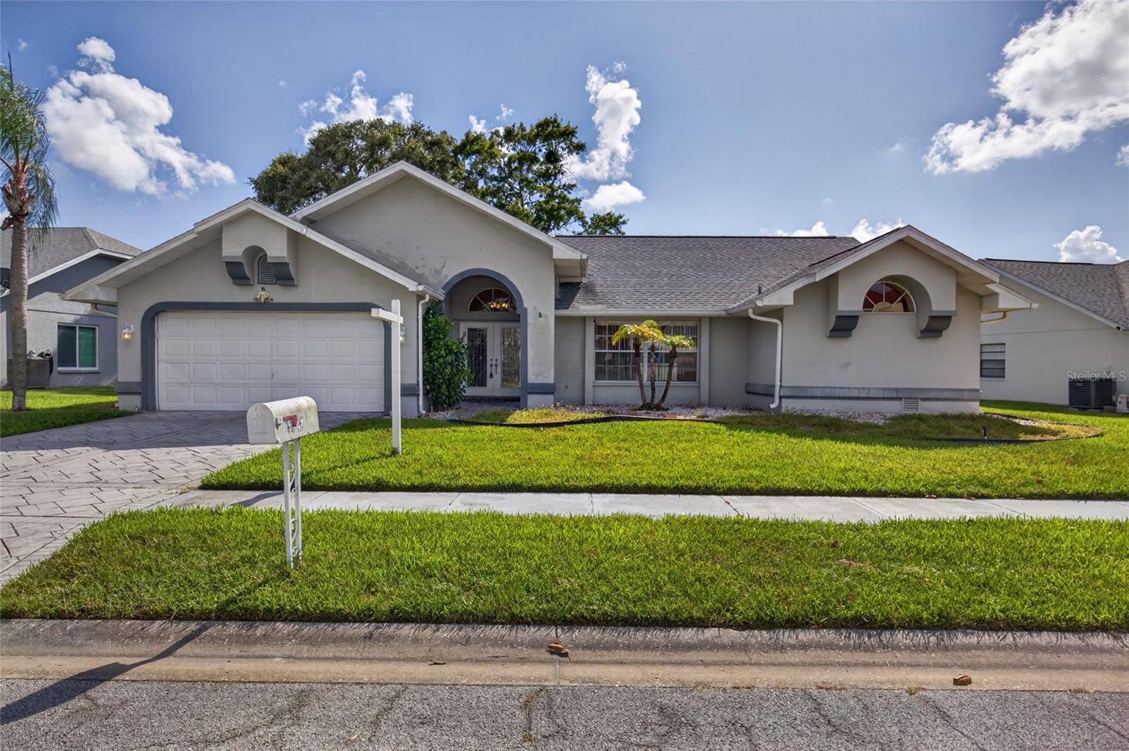 Located in Barrington Woods. This beautiful split 3-bedroom, 2-bath floor plan sits on a quiet cul-de-sac. This home offers Glass sliding doors off the great room lead to a shaded, decked patio area and a caged pool. NEW Roof and New AC. HOA amenities include clubhouse, pool, and fitness center. Grounds include tennis and more.  Close to shopping and beaches.