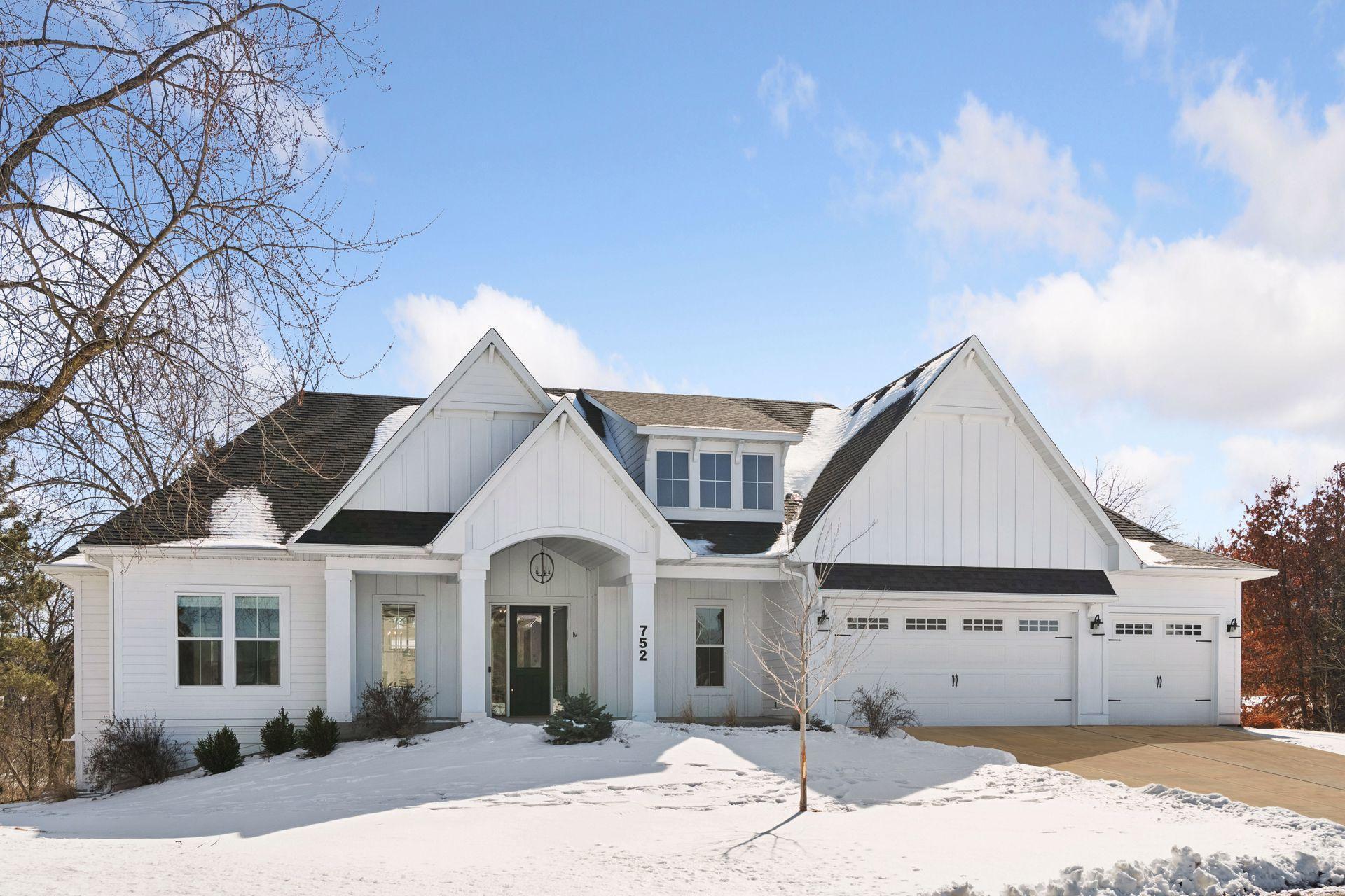 Exceptional home in a prime Eagan location, just off Diffley Road and minutes from Highway 3 and Pilot Knob Road. Offering the perfect blend of luxury, comfort, and convenience, this beautifully designed residence features a sprawling open-concept main level with elevated finishes and impressive architectural details throughout.The heart of the home is the expansive great room with soaring ceilings and dramatic floor-to-ceiling windows that flood the space with natural light. Rich materials and high-end surfaces create a warm yet refined atmosphere. The gourmet kitchen is thoughtfully designed for both everyday living and entertaining, showcasing premium countertops, abundant cabinetry, a large center island, butler’s pantry, and an oversized walk-in pantry for exceptional storage and prep space. Just off the main living area, the inviting three-season screened porch with its own fireplace provides the perfect setting to relax or host gatherings nearly year-round.Three bedrooms are conveniently located on the main level, including a luxurious primary suite designed as a private retreat. The spa-inspired ensuite bath features a soaking tub, walk-in shower, and generous vanity space, along with a spacious walk-in closet. Two additional bedrooms are connected by a well-appointed Jack-and-Jill bathroom, plus an additional guest bath for added functionality. Main-level laundry enhances everyday convenience.The lower level is built for entertaining and recreation, offering a massive family room with ample space for movie nights, game days, or hosting guests. A full wet bar with island seating creates the ultimate hangout space, while the walkout leads directly to the backyard for seamless indoor-outdoor living.Step outside to your fully fenced private backyard oasis featuring a heated in-ground saltwater pool. Ideal for summer relaxation, entertaining, and making lasting memories. The outdoor space offers both privacy and room to enjoy the seasons.Located in the heart of Eagan, this home provides easy access to numerous parks, trails, shopping centers, restaurants, and everyday amenities. Commuters will appreciate the quick connections to Highway 3, Pilot Knob Road, and major routes offering convenient access into the Twin Cities. Enjoy the balance of peaceful residential living with everything you need just minutes away.