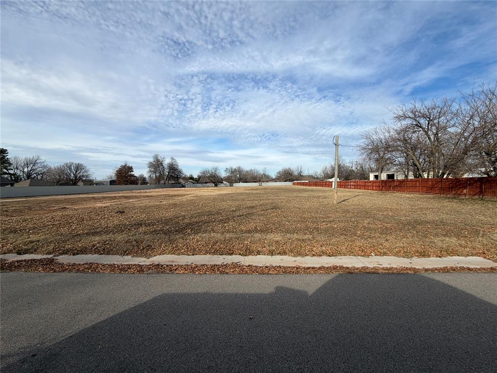 Rare opportunity in NW Moore!  Large 1.5 acre lot ready to build.  Partial fenced with metal fencing on one side and across the back, Wood fencing on the other side. Build your dream home  or split the lot and build two homes! Shops are also allowed! Plans must be approved by city. Moore utilities.  Quiet, established neighborhood on the border of N Moore/S OKC.  Close to major highways, popular restaurants, and Downtown OKC.