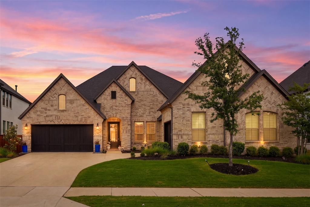 Experience luxury living in one of the most prestigious sections of Mustang Lakes, where timeless design meets modern sophistication in this exceptional custom built Coventry Home. Perfectly positioned on an oversized 74-foot homesite, zoned to the highly acclaimed Prosper ISD, this 2024-built single-story home offers an elevated lifestyle with 4 bedrooms, 3 baths, a private office, game room, and seamless open-concept design. The heart of the home is a true masterpiece, a chef’s kitchen curated for both everyday living and upscale entertaining, featuring over $75,000 in premium Sub-Zero & Wolf appliances, an expansive 12ft island, farmhouse sink, full-size dual fuel range with griddle, convection oven, walk-in pantry, elegantly appointed coffee bar, and built-in wine fridge. Inside, beautiful engineered hardwood flooring, custom built-ins, and statement lighting enhance the seamless open-concept design, creating a refined yet inviting ambiance ideal for everyday living and elevated entertaining. The primary suite offers a serene retreat with spa inspired finishes including dual vanities, a soaking tub, oversized walk-in shower, and a spacious closet. The secondary primary suite adds exceptional flexibility for guests or multigenerational living. Step outside to an extended covered patio overlooking a generously sized backyard, perfectly suited for relaxing or future outdoor enhancements. An oversized three-car garage provides both convenience and ample storage. Residents of Mustang Lakes enjoy a true resort-style lifestyle with access to a state-of-the-art clubhouse, fitness center, resort and lap pools, tennis and basketball courts, scenic lakes, miles of trails, playgrounds, and a vibrant community event calendar. With front yard maintenance included and shopping, dining just minutes away, this home offers the perfect balance of luxury, comfort, and convenience. A rare opportunity to own a meticulously designed home in one of the most sought-after communities.
