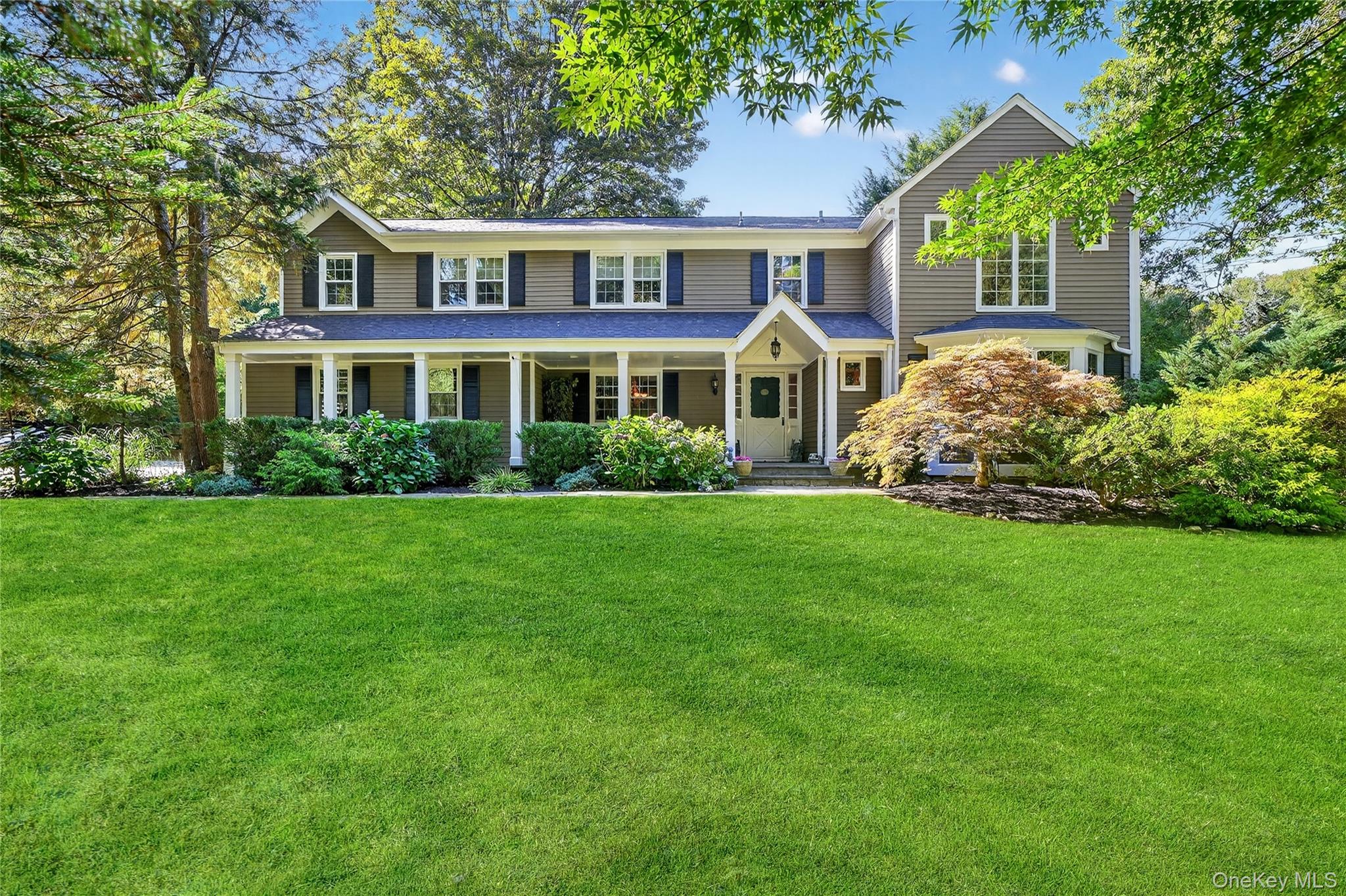 Welcome to 21 Mianus Drive — a beautifully expanded colonial set on a picturesque property featuring a rustic barn conversion. This home offers a wonderful blend of character, comfort, and modern living.

The main level boasts an open floor plan designed for entertaining, with multiple gathering spaces and an effortless flow from the eat-in kitchen to the outdoor patio, perfect for alfresco dining and seamless indoor/outdoor living. A convenient main level laundry room off the back entrance adds everyday practicality.

Upstairs, the private primary suite includes a spacious walk-in closet, a luxurious ensuite bath, and an adjoining sitting room ideal for a home office or quiet retreat. Four additional bedrooms complete the second level, including a second primary bedroom with its own ensuite bath and walk-in closet.

A home you do not want to miss in a desirable neighborhood. Located just a short drive to both Bedford Village and Armonk. Byram Hills SD.
