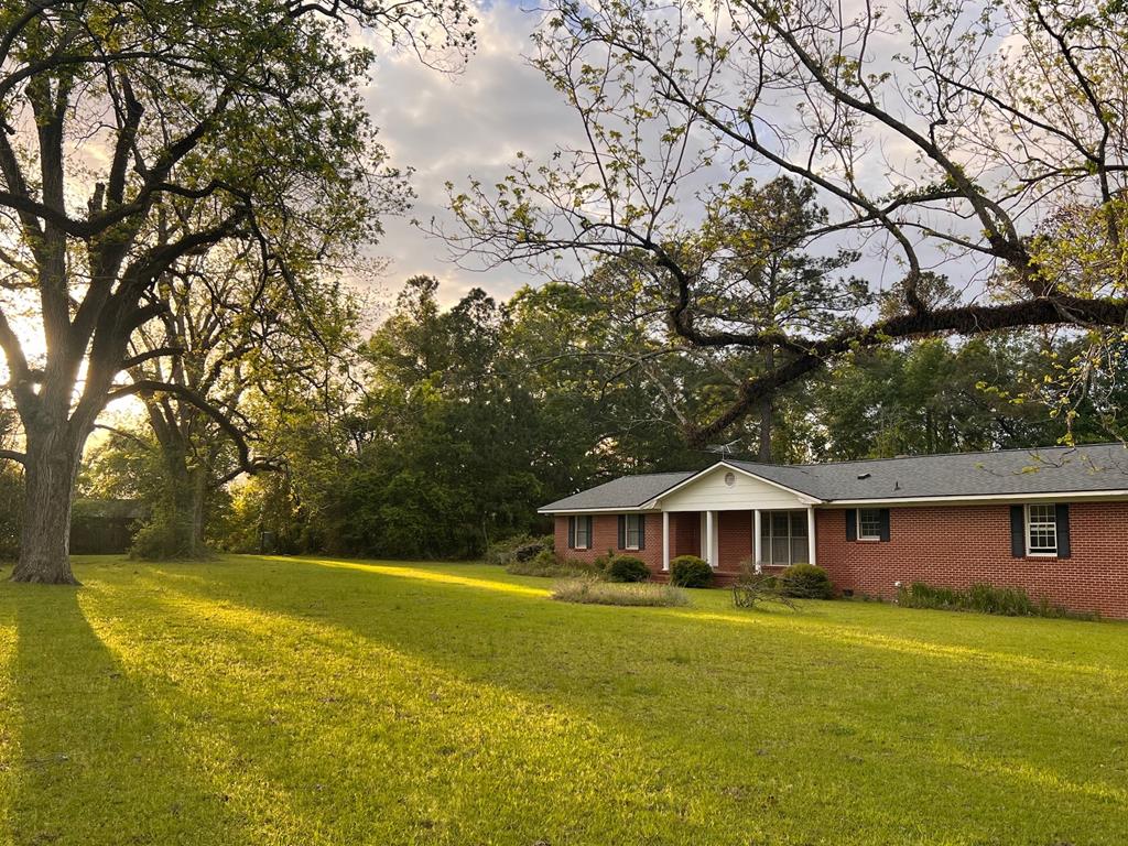 The Smith Family Farm is a cherished 80-acre Mitchell County homestead offering a rare blend of history, agriculture, and outdoor recreation. This property features 20 acres of fertile farmland, mixed hardwoods, and cutover pine areas, providing diverse habitat and land use opportunities. The 3-bedroom, 2-bath home — built in 1985 and encompassing 1,607 square feet — offers comfortable living quarters with a country setting. Steeped in generations of heritage, this old homestead dates back to the 1860s, with the original hand-hewn log cabin still standing as a testament to its storied past. Surrounded by large farms and expansive timberlands, the Smith Family Farm is a premier outdoor recreational retreat, boasting exceptional whitetail deer and turkey hunting throughout its varied terrain. A 10-acre field serviced by an existing power line presents a natural setup for an outstanding dove field, adding yet another layer of recreational appeal. Call today for details on this exclusive offering.
