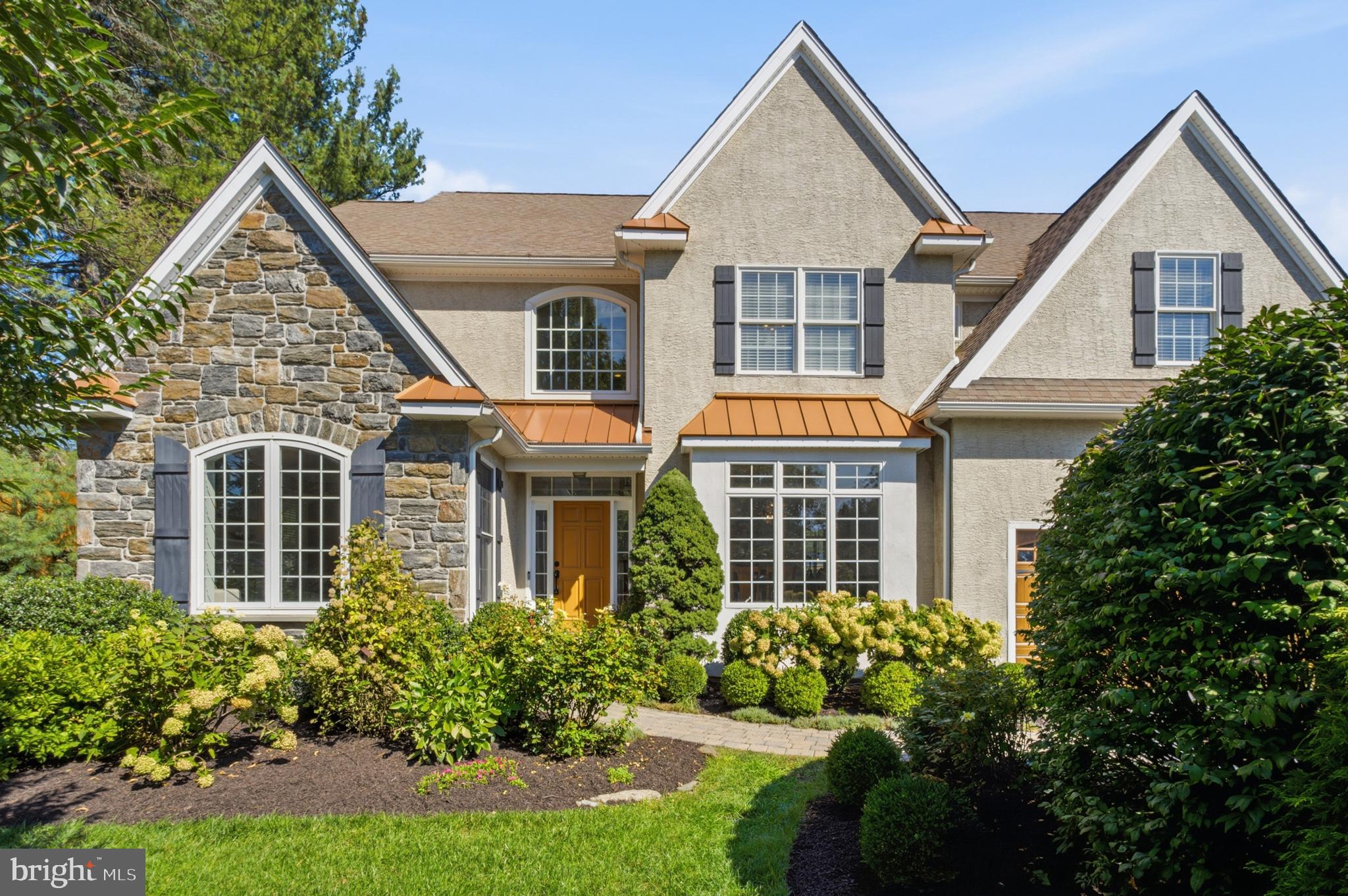 A rare opportunity to own a spectacular custom home, just 20 years old, offering over 5,500 square feet of finished living space in the heart of Wynnewood!  Argyle Circle is known for its central location, beautiful mix of older & newer constructed homes, all well kept & uniquely beautiful, & a walkability factor to many local parks, schools & all things Main Line. This incredible home offers 5 bedrooms, 4 full, 2 half baths & over 5,500 square feet of finished living space with 4,000 above grade!  The orientation of each room flows beautifully into the next; natural light comes in from all directions & the thoughtfulness of the floor plan truly is one of a kind.  Pull into the private driveway & head on in.  The 2 story center hall welcomes you & you'll immediately take a deep breath as this is the one you've been waiting for.  There couldn't be a better designed floor plan for today's lifestyle.  The main level of the home offers everything you'll need.  A beautiful entry hall, a gorgeous formal dining room with wainscotting & bay window, a formal living room with a gas fireplace, vaulted ceiling & large windows, the perfect home office with paneled French doors, a great room space open to the large kitchen, 2 powder rooms, butlers pantry, back mudroom entry off the attached garage & a walk in pantry.  The great room has a coffered ceiling, a 2nd gas fireplace & plenty of space for larger furniture, opening right up to the the timeless kitchen.  Two toned cabinets of a cream & maple toned, custom backsplash, center island with seating & fluted column detail, top of the line stainless steel appliances to include a double wall oven, upgraded fixtures, built in desk area, gorgeous arched window detail at the sink, overlooking the private backyard & a perfectly sized breakfast room with sliders out to the back pavers patio.  The butlers pantry is perfectly situated between the dining room & kitchen- perfect for your holidays & parties.  The orientation of the mudroom off the garage with built-in bench seat & coat closet functions perfectly for everyday life. The walk-in pantry is a bonus.  Upstairs, the 2nd floor has a spacious primary suite with a walk-in closet & a large full bath that includes both a soaking tub & shower, large double vanity & toilet closet.  There are 3 more very spacious bedrooms on the 2nd floor & 2 more full baths.  2nd floor laundry is a perk!  The spacious laundry room has a wash tub sink with ample cabinet space!  The lower level of this home offers ultimate versatility! A 5th bedroom option, a 4th full bath, large rec room space, while not compromising a huge storage room that can double as a home gym!  The current owners have poured so much love into this already custom home, enhancing its function for today's lifestyle.  The finished lower level, back paver patio with retaining wall, upgraded Hvac systems, newer garage door & many other improvements have been made.  This home offers choice of high school- Harriton or Lower Merion!  Tucked away on a quiet Wynnewood cul-de-sac, yet within walking distance of neighborhood parks such as South Ardmore, just across Argyle &  Lancaster ave shopping & dining.  This home has it all & as soon as you walk in, you'll feel it.