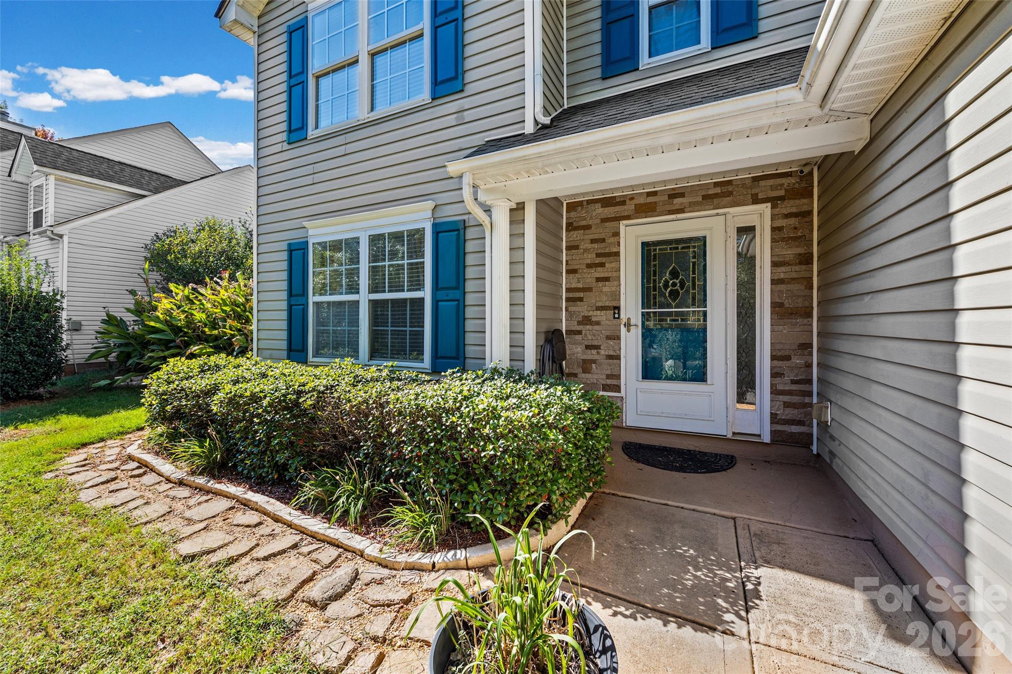 This 3-bedroom, 2.5-bath home offers a functional layout with plenty of features to enjoy inside and out. The family room is anchored by a wood-burning fireplace, while the kitchen includes a pantry for convenient everyday storage. Upstairs, the spacious primary suite features vaulted ceilings, a large walk-in closet, and private bath, with the laundry conveniently located nearby.Step outside to a travertine tile patio and gazebo that create space for grilling, entertaining, or relaxing by the above-ground pool. The yard also offers room for gardening, while a storage shed provides space for tools, lawn equipment, and pool gear. A RainSoft water filtration system adds another practical upgrade. With comfortable living spaces, a backyard to be enjoyed, and a convenient location near Lake Wylie, this home offers plenty of ways to make the most of life at home.