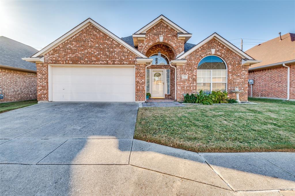 Wow! Beautiful! One-Story Custom Home in a Gated Community!
Experience refined living in this impeccably maintained 3-bedroom, 2-bath, 2-car garage residence, perfectly blending luxury, privacy, and convenience in the heart of the DFW Metroplex. The open-concept design is filled with natural light and showcases beautiful ceramic tile flooring throughout. The chef’s kitchen features granite countertops, a large island, 42-inch cabinetry, and premium electric appliances, flowing seamlessly into the spacious living area with an elegant electric fireplace — perfect for entertaining or relaxing.

The thoughtful split-bedroom floor plan ensures comfort and privacy for all. Enjoy a low-maintenance lifestyle with front yard care included in the HOA and a peaceful neighborhood courtyard just steps away. Ideally located near premier shopping, dining, major highways (183 & 121), HEB Hospital, and DFW Airport.

Bonus: Refrigerator, washer, and dryer convey with an acceptable offer.
This move-in-ready home offers exceptional quality and convenience — Welcome Home!