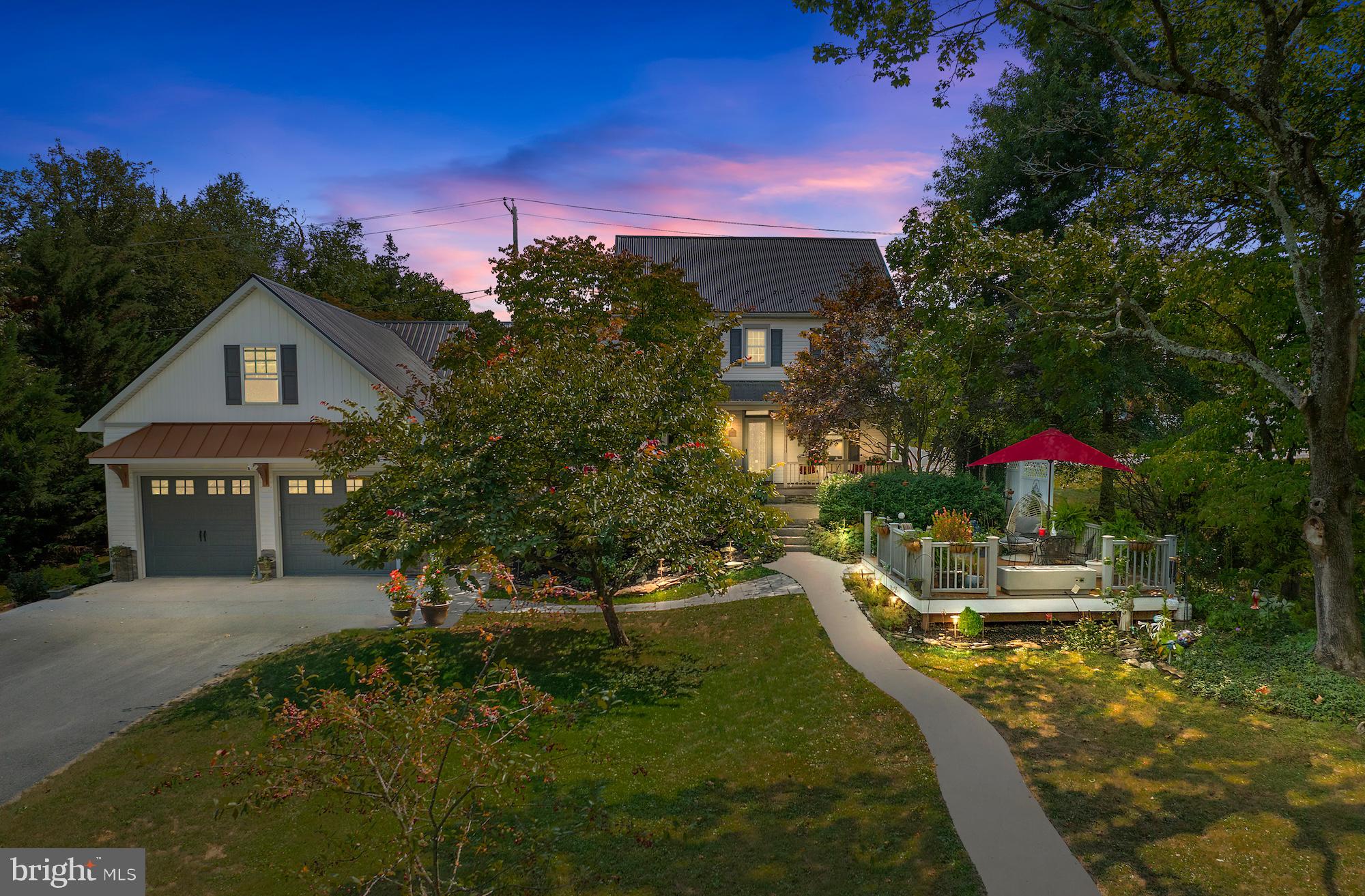 Welcome to the heart of Arendtsville Borough apple country! This spacious 4-bedroom, 2.5-bath home offers 2,818+/- sq. ft. of living space on .4 acres with thoughtful renovations spanning from 1997 to today. The luxurious primary suite features a stone wood-burning fireplace, 10x10 walk-in closet with custom shelving, and a spa-inspired bath with heated tile floors, large tiled shower, and jetted soaking tub.The remodeled kitchen (2023–24) shines with stainless appliances, granite countertops, and prep sink with additional cabinetry in the pantry. Entertain with ease on the 16x30 composite deck with propane fire pit or the 16x20 concrete patio, both overlooking the fenced garden with hardwired landscape lighting.Recent updates include a new metal roof (2023), 2-car garage with storage and EV charger (2024), energy-efficient windows, and wiring for a home generator. A vinyl privacy fence completes the backyard retreat. This home blends modern upgrades with comfort, all set in a charming small-town community surrounded by orchards.