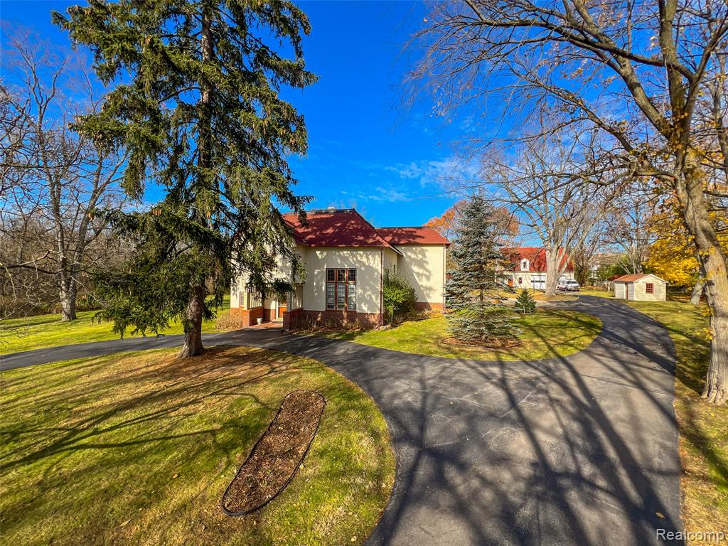 A rare opportunity in Bloomfield Hills, this historic 1921 residence is set on an extraordinary 9.3+ acre parcel within the prestigious Bloomfield Hills Estates subdivision. Offering approximately 5,300 square feet of living space, the home showcases timeless character and expansive room sizes, ready to be reimagined or enhanced to suit today’s lifestyle. The true distinction lies in the land—over 9 acres in the City of Bloomfield Hills is exceptionally rare. With favorable deed restrictions allowing up to four dwellings, this remarkable property presents endless possibilities for estate living, development, or investment. Enjoy a private, serene setting with abundant space for outdoor living, recreation, and future vision, all while being just minutes from area amenities, shopping, and dining. A truly unique offering with unmatched potential in one of the area’s most sought-after locations. Contact us today to learn more about this exceptional property.