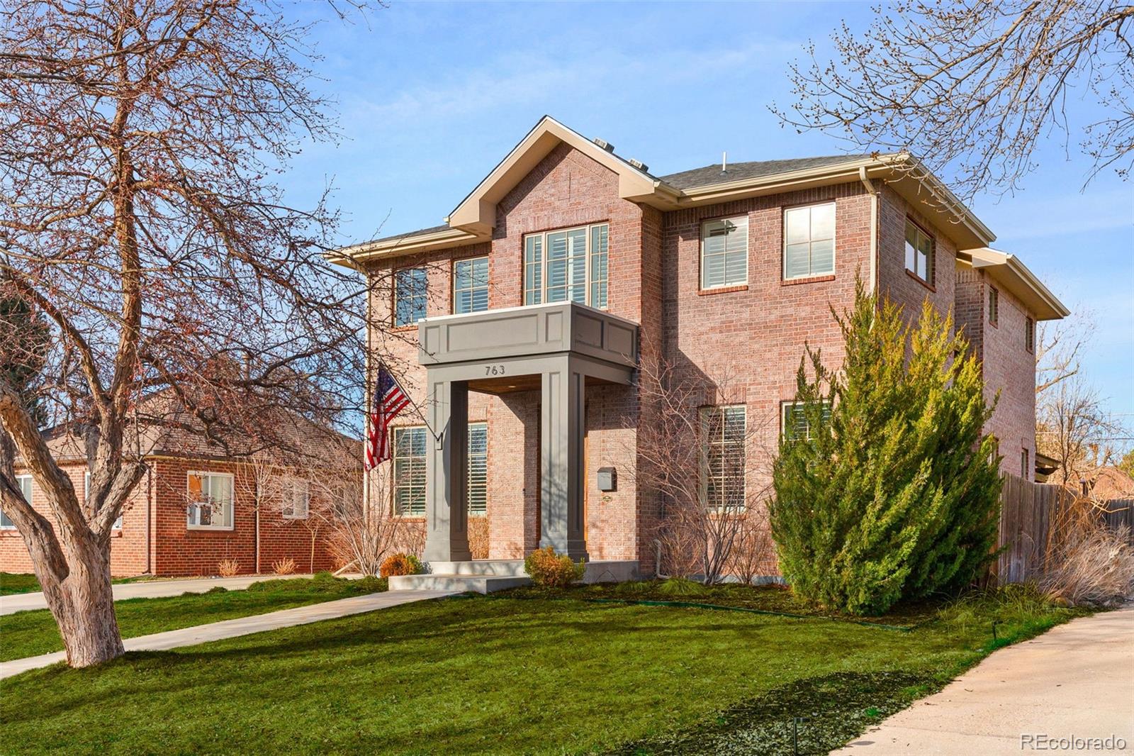 Timeless design and finishes define this gracious Mayfair home, built in 2014. Throughout the home, an attention to detail is evident in the custom millwork, elegant iron stair railings, and beautiful hardwood floors. A classic gourmet kitchen impresses with its oversized island, stainless appliances, and honed marble countertops. Hosting is a breeze, with seamless flow from kitchen to dining through a well-appointed butler’s pantry - complete with a beverage fridge. The formal dining room showcases striking coffered ceilings. Relax in the spacious great room, with a cozy marble gas fireplace, beamed ceilings, and slider to backyard. Upstairs, you’ll find three generously sized bedrooms, plus convenient second-floor laundry. A luxurious primary suite includes a spacious walk-in closet, additional nook for home office or sitting room, and a spa-inspired five-piece bath, complete with a soaking tub and steam shower. A “secret” playroom between the two additional bedrooms adds to the charm. This flex space could also be combined with the hall bath to create a larger shared bathroom. A large family room anchors the basement space. Two additional bedrooms round out the lower level - one currently in use as a home gym, complete with sauna (included). Don’t miss the custom wine cellar with beautiful brick flooring. On the back patio, enjoy outdoor living area designed for year-round enjoyment, featuring a built-in grill, pizza oven, and fire pit, with both covered and uncovered entertaining space. Additional custom features include a whole-home water filtration system, reverse osmosis drinking water system, and whole-home humidifier. An incredible opportunity for over 4,000 sq ft of move-in ready space in Carson Elementary district, with easy access to Cherry Creek, 9&Co, and multiple neighborhood parks.