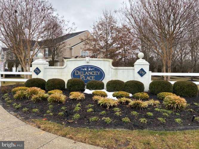 Beautifully maintained end-unit Delancey townhome, move-in ready and thoughtfully updated throughout! Enter through a classic black door into a bright, open floor plan featuring new laminate flooring across the entire first floor. Spacious living room with charming window seat flows seamlessly into the dining area—perfect for everyday living and entertaining. Updated kitchen boasts white cabinetry, granite countertops, newer stainless steel appliances, recessed lighting, and an oversized walk-in pantry. Sliding glass doors with built-in blinds lead to a private patio with privacy fence and courtyard views. Convenient first-floor powder room. Upstairs features plush neutral carpeting, second-floor laundry, and an expansive primary suite with triple windows, walk-in closet plus additional closet, and en-suite bath with soaking tub, stall shower, and private water closet. Two additional generously sized bedrooms share a well-appointed hall bath. Ideally located close to major roadways, shopping, and everyday conveniences. Pristine condition—don’t miss this opportunity!