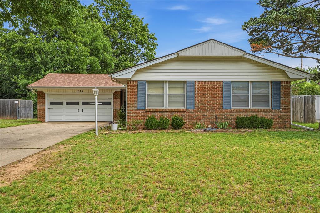 3 bedrooms | 1.5 bath | 1,268 sq ft | STORM SHELTER, New Electrical Panel! Just minutes from the University of Oklahoma, this home is set in a charming tree-lined neighborhood w/ easy access to campus & nearby conveniences. Welcoming entry sets the tone from the moment you step inside with wood-framed glass panel door, entry storage & just steps away from the kitchen. The living room is spacious with sliding glass patio door that fills the space with natural light & opens directly to the backyard. Beautiful parquet hardwood flooring extends throughout the living room, dining area, hallway, & bedrooms, adding warmth & continuity. The kitchen features an efficient L-shaped layout designed for function & flow, offering an abundance of cabinet & counter space. Quartz white countertops pair with a cobalt blue backsplash for a clean, modern look. An undermount sink with brass accents sits beneath a pass-through window overlooking the living area. Stainless steel appliances include a gas range with a center burner, a built-in microwave, a dishwasher, & a refrigerator, all included. The dining area sits just off the kitchen & remains open to the living room, maintaining an easy connection between spaces while still feeling defined. Each bedroom has natural light & ceiling fans. Two bedrooms offer additional space for a sitting area or desk setup. The primary bedroom includes a private half bath, & full bath serves the secondary bedrooms. Enjoy a large, fully fenced backyard with an expansive patio, offering a wide-open outdoor space with a blank slate to create, gather, & enjoy! The two car attached garage features a storm shelter located on the garage floor. Located approximately 1.4 miles from the University of Oklahoma, w/ quick access to campus, dining, shopping, and game days. Move-in ready, full of charm, and ready for its next chapter! Come see it, fall in love, and make it yours—schedule your private showing today!