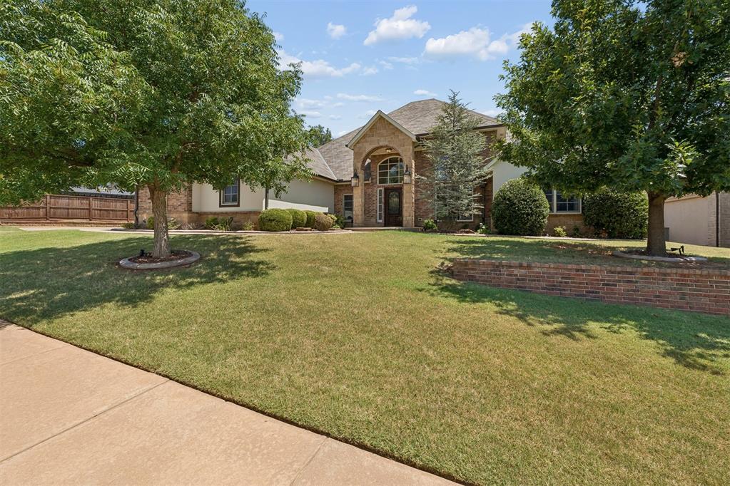 Beautifully designed home on a large lot in Rose Creek in Deer Creek Schools! This floor plan is exceptional from the time you walk in to the high ceiling entry and views straight out the backyard to the pool! The living room with fireplace is open to the Kitchen and breakfast area filled with windows for natural and a view of the pool!  Adjacent to the living is a large downstairs media/bonus room that could be used as a 5th bedroom if needed. Large master bedroom, great shower and oversized walk in closet! 2 additional bedrooms downstairs with a Jack and Jill bath and 1 bedroom is upstairs along with a double-large bonus room with walkout covered balcony overlooking the pool and surrounding mature trees! Ample parking and on a quiet street! Walk-in safe room INSIDE the house! Call me for a showing!