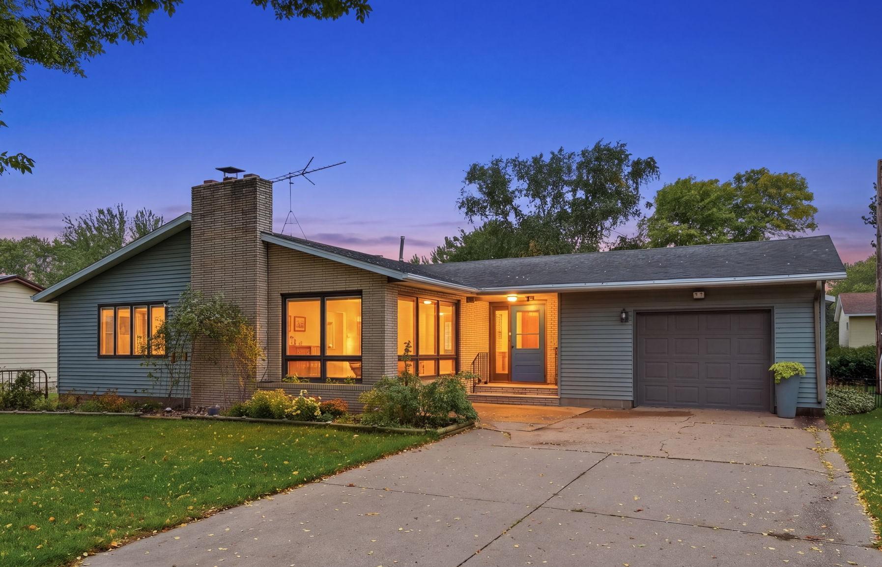 This 4-bedroom, 2-bath home offers plenty of space, natural light, and opportunity to make it your own. The main level features three bedrooms, a spacious living room with large windows and a wood-burning fireplace. The white quartz countertops add a bright, modern touch to the kitchen. Downstairs, you’ll find the fourth bedroom, a massive family room with plenty of space for entertaining, hobbies, or additional living space, plus a large storage room. The attached one-stall garage is an impressive 48 feet deep, providing plenty of extra room for a workshop, storage, or recreational equipment. Out back, enjoy a nice patio area along with a handy storage shed that already has electricity connected. With great square footage and tons of potential, this home is ready for someone to bring their ideas and personal touches to life.