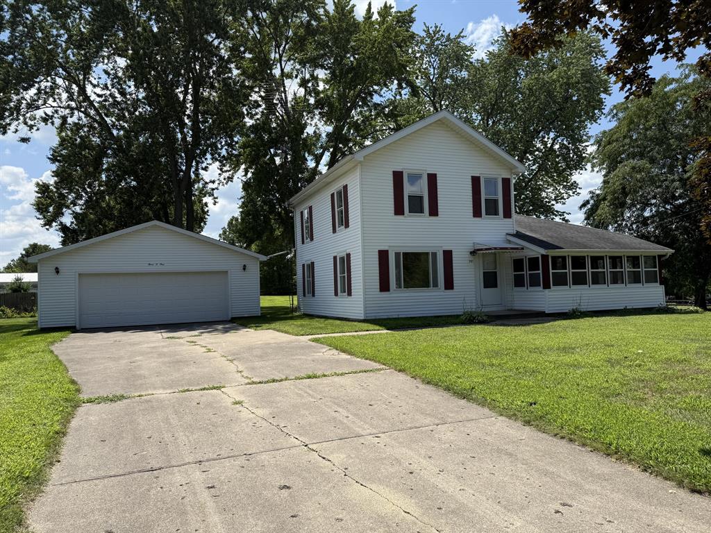 CHARMING  HOME IN THE CTY WITHIN WALKING DISTANCE OF SCHOOLS, DOWNTOWN, CHURCHES.  DOUBLE LOTTHIS HOME FEATURES ALL NEW FLOORING THROUGH OUT.  LARGE EAT-IN KITCHEN, LARGE LICING/FAMILY ROOM, ENCLOSED FRONT PORCH, FIRST FLOOR LAUDRY.  BRS ARE ON UPPER LEVEL, THERE IS A BONUS ROOM THAT COULD BE A 3RD BR/NURSERY/OFFICE OVERSIZED DETACHED GARAGE WIT WORKSOP AND GARDEN SHED.  BEAUTIFUL MATURE TREES. IMMEDIATE OCCUPANCY