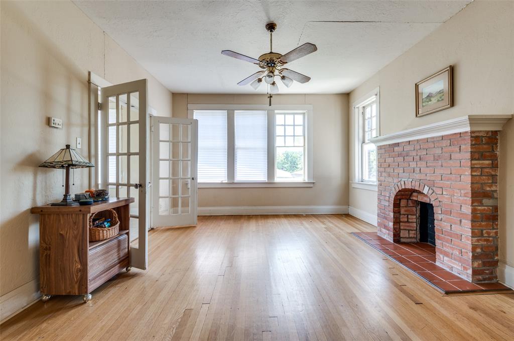 Diamond in the rough. This 2-bedroom, 2-bath condo in the Viola Courts community is a great opportunity for someone looking to renovate and restore a piece of Dallas history. Located just outside the Swiss Avenue Historic District, the building was constructed in 1923 and is listed on the National Register of Historic Places. The building features a grand central staircase that sets the tone with timeless architectural character. Inside the unit, large windows provide abundant natural light, highlighting the original details and offering a bright, inviting feel. Shared balcony just outside your door overlooking Swiss Ave. The unit includes one gated, assigned parking space, laundry and storage in the basement, and in-unit laundry hookups. Appliances in unit don't work. Located in a vibrant East Dallas neighborhood, enjoy easy access to nearby shops, dining, and entertainment in Lower Greenville, Lakewood, and Downtown Dallas.