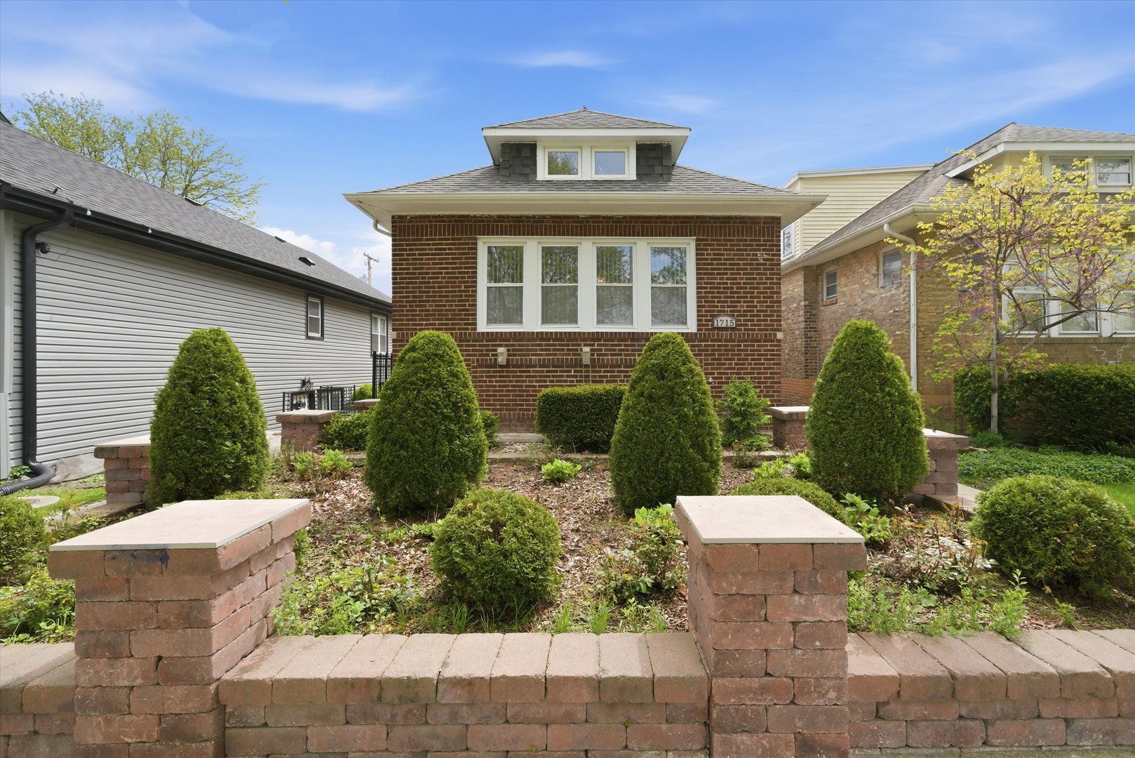 Charming and spacious brick home in a convenient Evanston location! This well-maintained home features 7 bedrooms and 2 full bathrooms with plenty of living space throughout. Beautiful hardwood floors, a bright and functional layout, and a finished basement provide extra space for living, entertaining, storage, or a home office setup.  Major rehab completed in 2011, including new roof, windows, plumbing, furnace, and a newer 2.5-car garage.  Enjoy the fenced backyard and outdoor space perfect for relaxing or gatherings. Located near schools, parks, shopping, restaurants, public transportation, and just minutes from downtown Evanston and Chicago.  A wonderful opportunity to own a spacious home in a great neighborhood. Easy to show!
