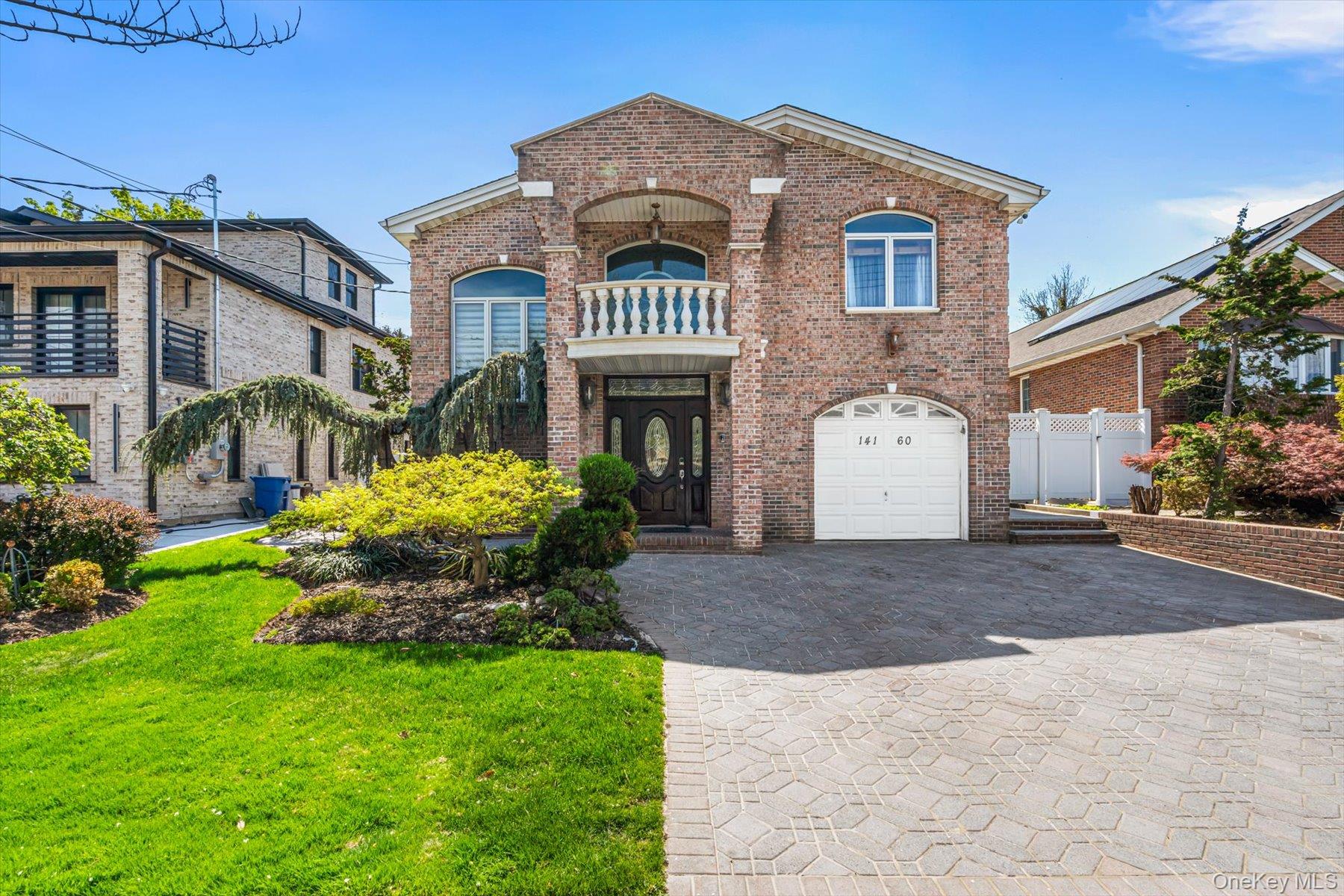 Welcome to this stunning Grand brick colonial nestled in beautiful Malba neighborhood. Spanning approximately 3,600 square feet, this elegant home seamlessly blends timeless craftsmanship with modern upgrades.Step inside to discover soaring 12-foot ceilings adorned with intricate crown molding and beautifully maintained radiant-heated granite flooring, offering both luxury and comfort year-round.The fully renovated kitchen is a chef’s dream, complete with sleek stainless-steel appliances, ample cabinetry, and a spacious eat-in area perfect for casual dining. Entertain effortlessly with a dedicated wet bar and a versatile bonus room featuring a cozy wood-burning stove.Designed with both functionality and style in mind, the home offers multiple closets for abundant storage, a convenient half bath for guests, and an attached garage for added ease. Enjoy year-round relaxation in the enclosed porch or take entertaining outdoors to the fully equipped outdoor kitchen.The exterior is equally impressive, featuring a beautifully manicured backyard, an above-ground pool with a custom deck, and ample space for outdoor enjoyment. Additional highlights include fully owned Solar Panels, 9-zone heating system and 2-zone central air conditioning for optimal comfort and efficiency.This exceptional property combines space, sophistication, and comfort, a place to call home!