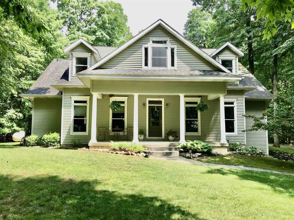 Gorgeous quality constructed home and acreage just W of Mt Pleasant. Back into subdivision from Pickard, private and secluded wooded setting with large custom home, pole barn, and 12.5 acres. Many gorgeous custom finishes. Stunning kitchen has Corian black fleck counters, stainless steel appliances, new Whirlpool range with double lower convection oven, butcher block counter section, walk-in pantry, seeded glass cabinet for show pieces, and desk. Living room with gas fireplace overlooks back covered porch overlooks wooded back yard. Stunning landscaped yard. All blacktop driveway to house, garage, and pole barn. Spacious master bedroom, bath, and walk-in custom closet. Full mostly-finished basement has bar, family game area, movie night area, table games area, table tennis room, workout room, and craft room with many outlets at counter height (just needs counter,) and childrens playhouse area. Upstairs mostly finished, without floor coverings at the moment, has vaulted ceilings and separate office. Currently 3 bedrooms, opportunity for a 4th in the basement, and more in the opening upstairs. Stunning views from practically every window. Many extra features such as: 2x6 construction, 3 overhang, transom windows throughout main floor, 9 ceilings, stunning walnut and birch flooring, hot and cold spigots in garage (dog washing,) stamped concrete walkways, lighted horseshoe pits, plenty of 20-amp outlets, CMS fiber internet. Inside bathroom and bedroom walls are almost all the way insulated. Property is available 3 ways: In its entirety for $875,000 (See MLS# 1936183,) or just home, barn, and 5.59 acres on East side of Amber Lane for $775,000 (See MLS# 1936191, subject to township approval of split,) at that point the 6.93 wooded acres on the West side of Amber Lane is available for $105,000, subject to township approval of split. Property is zoned agricultural. Home warranty included with full price offer.