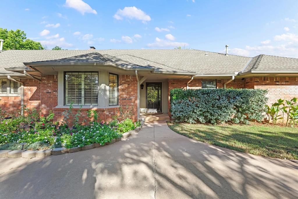 EXCEPTIONAL SPACE, DISTINCTIVE DETAILS & BACKYARD LIVING!  Set on .98 acre in Woodruff's Tall Oaks neighborhood, this 3,841-sq-ft home pairs generous living spaces with distinctive craftsmanship & beautiful outdoor living. A circle drive, mature trees and flowering landscaping create a welcoming first impression. New wood flooring throughout the living areas, bedrooms & formal dining room, distinctive architectural woodwork, custom wood shutters in nearly every room, and marble windowsills throughout add warmth, character & timeless appeal. The expansive living room features a wood-burning fireplace & a wall of windows overlooking the swimming pool, substantial covered patio and tree-lined backyard. An adjoining game room offers extensive built-ins for entertainment & recreation. The spacious kitchen features a large island with pullout drawers, double ovens, electric cooktop, distinctive tile flooring & a walk-in pantry. A convenient pass-through connects to the formal dining room, while the breakfast area includes a wet coffee bar & access toward the pool. A nearby half bath is ideal for guests. The generously sized primary suite offers a jetted tub, dual vanities, a large walk-in shower with dual shower heads, and two walk-in closets with built-ins. Three additional bedrooms provide flexibility for family, guests or office use. One bedroom has a private full bath & direct outdoor access; another features a large walk-in closet with built-ins. One bedroom is currently used as an office. A dedicated service entrance leads to an oversized laundry room with abundant counter space and storage, plus room for an extra refrigerator and freezer. The laundry room connects to the garage, which includes a storm shelter. Enjoy the swimming pool, covered patio with redone concrete, new backyard retaining walls, sprinkler system and beautifully landscaped grounds. Additional features include a well, septic system, two water heaters, water softener and refrigerator that stays.