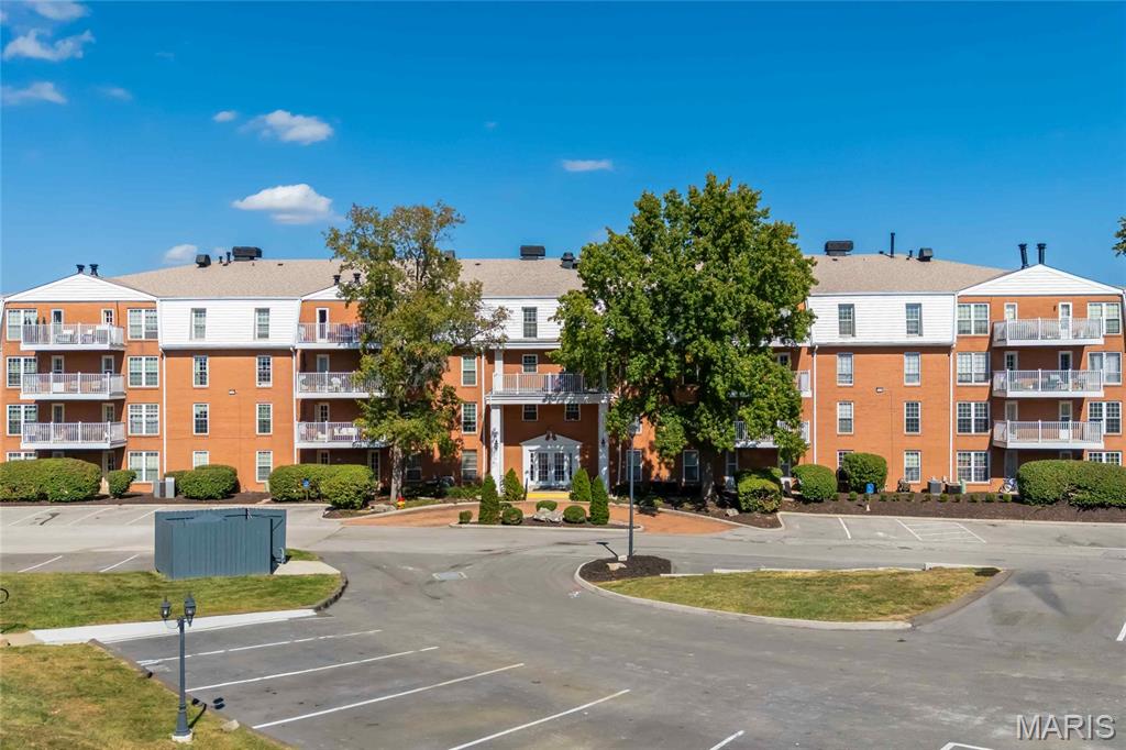 Enjoy the ease of single-level living in this spacious, move-in-ready 3-bedroom, 2-full-bath condo offering an ideal combination of comfort, style, and convenience! Step inside to discover a bright and inviting interior featuring hard-surface flooring throughout, fresh paint, and updated light fixtures. The generously sized living room provides the perfect space to relax or entertain, while the adjoining dining area flows seamlessly into the beautifully updated kitchen featuring granite countertops, stainless steel appliances, and ample cabinetry. Step outside onto your private balcony to enjoy your morning coffee or unwind after a long day. The spacious primary suite offers a comfortable retreat with its own private full bath, while two additional bedrooms provide flexibility for guests, a home office, or additional living space. Additional highlights include secure building access, elevator service, underground garage parking, and convenient in-unit laundry hookups. With its thoughtful updates, functional layout, and low-maintenance lifestyle, this condo offers an exceptional opportunity for comfortable, convenient living. Don't miss your chance to make it yours!