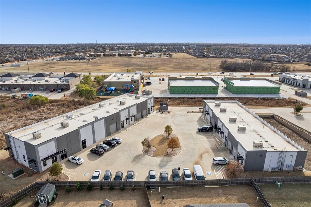 Industrial Park Investment Opportunity! Retail & Warehouse Space! This industrial park features two buildings offering a mix of retail and warehouse space, making it a versatile investment opportunity. With five leased spaces and one available warehouse unit, this property provides steady income with room for additional potential. The space boasts 22’+ ceilings, ideal for storage, inventory management, or light manufacturing. Its adaptable design allows businesses to tailor the space to their needs, making it an attractive option for a variety of industries. Located in a high-demand commercial area, this property offers both functionality and a prime location for businesses looking to expand or establish a presence.