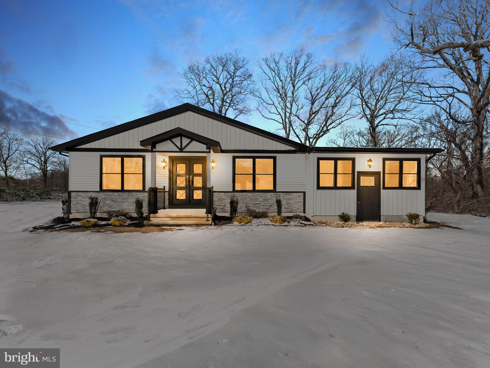 Welcome home to this beautifully renovated property featuring a stunning open-concept layout and modern finishes throughout. The heart of the home is the gorgeous designer kitchen, complete with a massive center island, brand-new appliances, and plenty of space for cooking, entertaining, and gathering. The adjoining family/living room offers an inviting ambiance with an elegant electric fireplace that truly sets the mood.This spacious home offers 5 bedrooms and 3 full bathrooms, including a private primary suite with its own full en-suite bath. Two additional bedrooms and a full hallway bathroom are located on the same side of the home for added convenience. The opposite wing features two more bedrooms and a full bath — an ideal setup for an in-law suite, guest quarters, teen or kids’ space, or a dedicated work-from-home area. The layout offers flexibility and endless possibilities.The exterior has been completely renovated for beautiful curb appeal that will make you fall in love the moment you arrive. A huge basement provides additional opportunity for storage, recreation, or future finishing, and the large, fully cleared yard offers the perfect space for outdoor enjoyment.This move-in-ready home truly has it all — space, style, and versatility. Come see her before she’s gone!