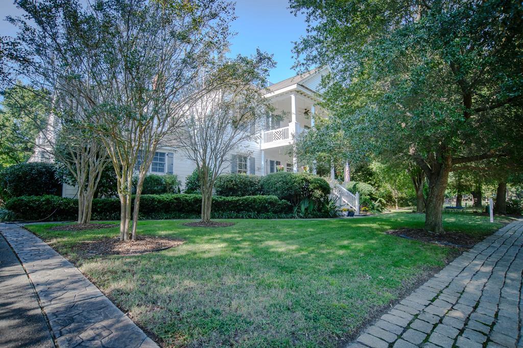 Based on the Hope Mansion in Windsor North Carolina. Discover your slice of paradise where luxury meets lifestyle in this 5600 sq foot home nestled along the 1st fairway of the Bay-Creek golf course. The home offers a blend of serene seclusion and vibrant community living. It's perfect for those who crave coastal elegance without the hustle. With dedicated walking and golf cart paths winding through the neighborhood, hop on your cart for a quick ride to the private beach, clubhouse or neighborhood events. Step inside to this 3 story, light filled, living space offering 5 bedrooms, 5 full baths and 3 half baths.The elevator will take you to each floor with steps up to a "widows walk" for breathtaking views. A third floor offers a lounge and study.The real gem? The 1 bed /1 bath guest suite.