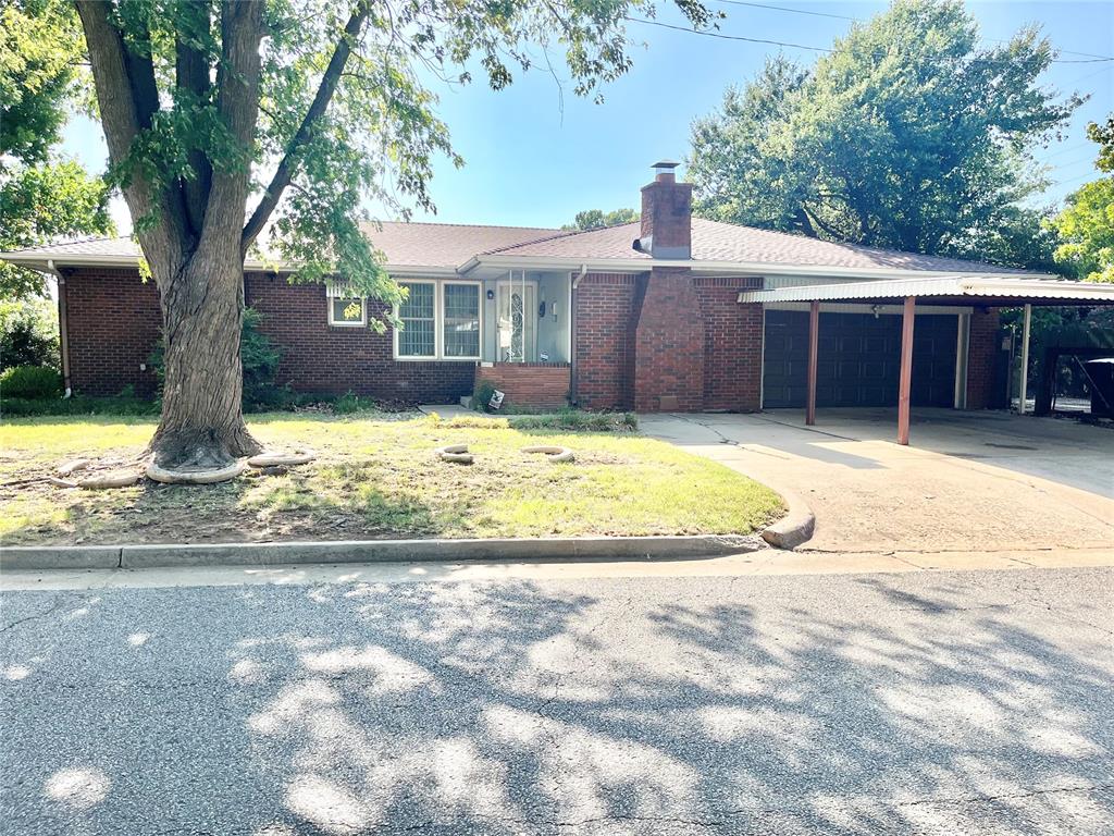 Lots of potential in this house.....Large second living area could be third bedroom.  Half bath is in the garage.  Fireplace.  Covered, enclosed patio, not included in the square footage.  Measure Right drawing is in the supplements.  New roof.