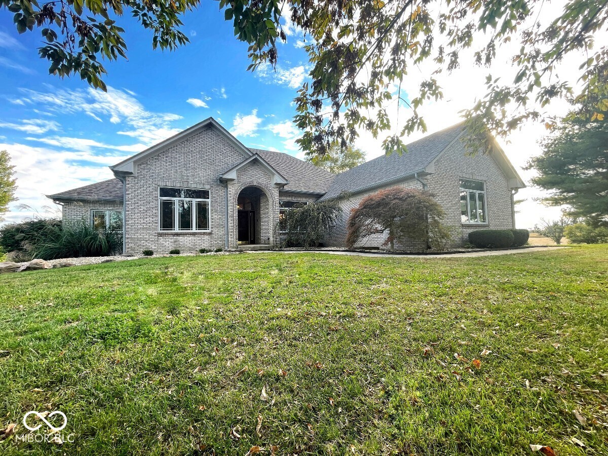 Spacious 5478 sq. ft executive home on 2+ acres with mature trees in a rural setting but only 10 minutes from I-65 and ample shopping and restaurants. Home features 4 bedrooms, 3 full baths and 2 half baths and a finished daylight basement with kitchenet. Interior highlights include 10-ft ceilings, solid oak hardwood flooring, granite kitchen countertops, crown molding and solid 6-panel doors. Recent updates include: New roof 2022, all new Pella casement windows in 2023, high efficiency basement furnace in 2024, new water softener in 2025, 22KW whole home generator in 2023.