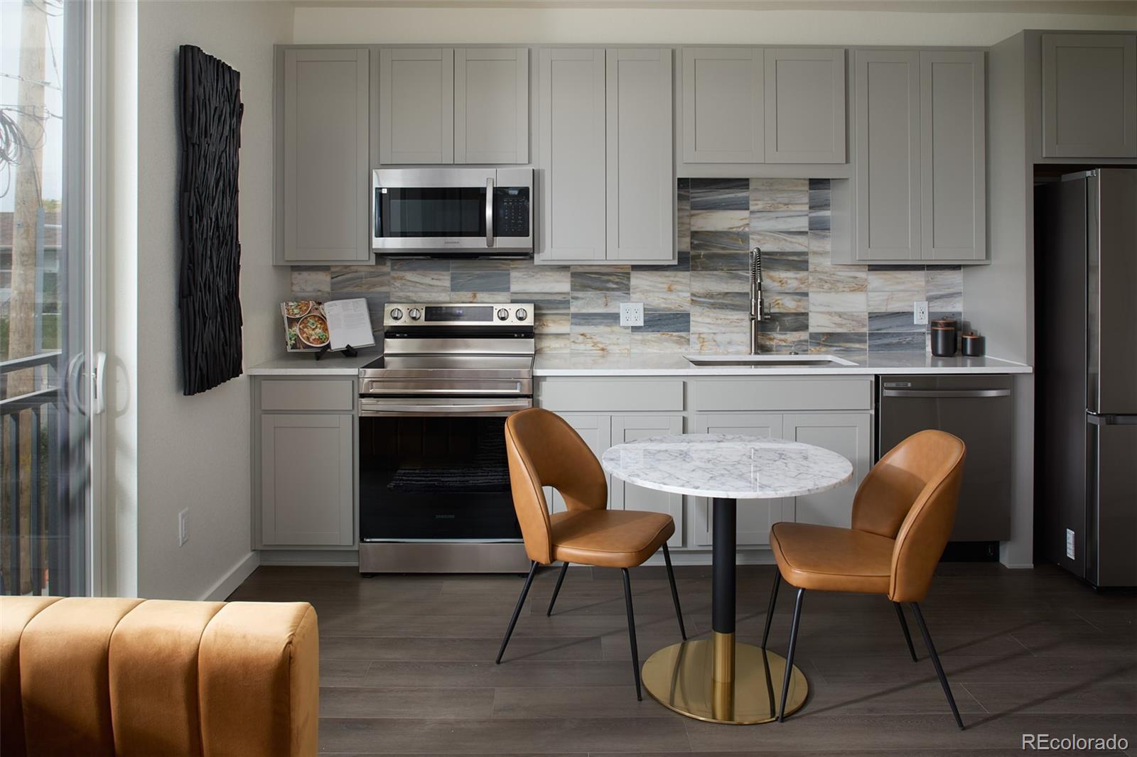 Now selling at Sloan’s Lake’s most anticipated new community—move-in ready by late July. This ground-floor, northwest-facing urban flat blends modern design with unmatched access to Denver’s most beloved lakefront lifestyle.Introducing the Starla, a stylish one-bedroom, one-bathroom flat. The open-concept floor plan seamlessly connects the living and dining areas, while the full kitchen is outfitted with modern appliances and sleek Kohler fixtures. Oversized windows fill the home with natural light, creating a bright and welcoming atmosphere. You’ll love the low-maintenance lifestyle with surface parking available. The Telluride design package brings a warm, timeless aesthetic with neutral-toned flooring, wood-toned cabinetry, and white quartz countertops with subtle veining, creating a timeless yet modern backdrop for your home.Take advantage of the vibrant Sloan's Lake neighborhood, with easy access to trendy cafes, eclectic shops, and beautiful park spaces. The Starla combines modern sophistication with practical comfort, creating an elevated living experience in the heart of the city.Contact our sales team today at (720) 656-4512 or email sales@lokalhomes.com to secure your spot.