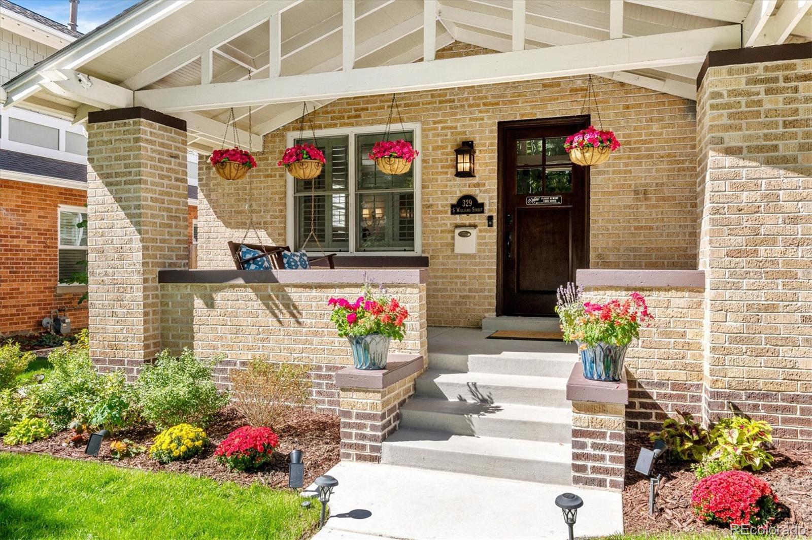 This bespoke Wash Park renovation is the perfect balance of historic Denver architecture with modern updates and execution. The covered front porch overlooks the tree-lined street, just moments from the park. Once inside, the living room boasts charm with a more contemporary sensibility.The inviting kitchen includes custom cabinetry, quartz surfaces, premium appliances, and a central island that serves as the heart of the space. It connects seamlessly to a dedicated dining area with two built-in bar & service areas, catering to your everyday living and your elevated entertaining.At the rear of the home, the expansive family room extends seamlessly from the kitchen to the outdoor patio and garden. The beautifully landscaped area centers around the gas fire pit, offering a year-round retreat that blends effortlessly into its intimate garden surroundings.The home's primary suite has been elevated to create a quietly luxurious space, defined by a custom-built designer closet system, dual marble vanity, integrated lighting, and walk-in spacious shower.The lower level renovation displays a beautifully updated bedroom and bath, an enhanced laundry space, complete with a dedicated dog wash. The large flex space adapts easily as a media room, fitness area, guest quarters, or additional living space. A built-in ski and bike workshop space is a wonderful addition that can be further customized to meet any family's particular needs.With the home's inviting back patio so thoughtfully designed for relaxing, entertaining, and simply enjoying life you will also love the new turf side yard created as a haven for furry friends and children to play. The home offers effortless year-round living.Positioned near Washington Park, Gaylord Street, and Pearl Street, the location places some of Denver's best dining, boutiques, and retail right at your doorstep, offering an ideal blend of vibrant neighborhood charm and the serene beauty of the Park itself.