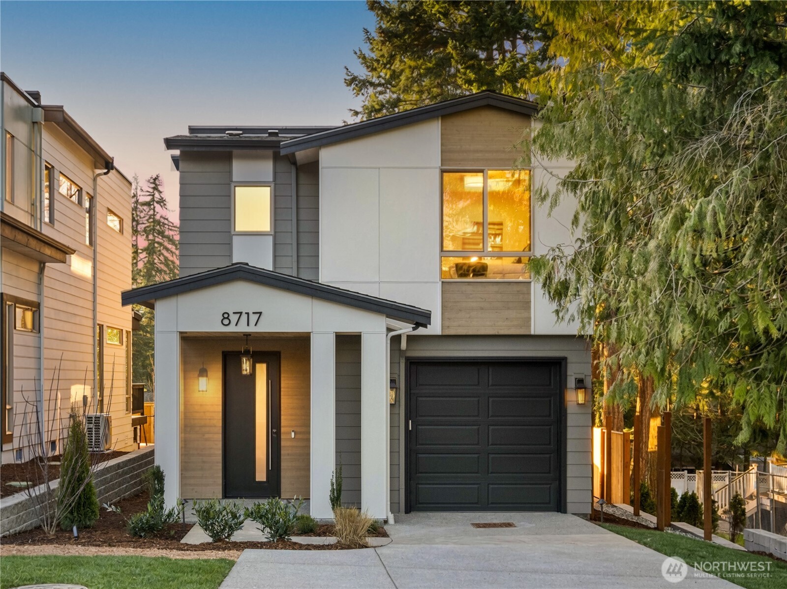Merit Homes presents Wilder Lot 4! The 4-home community in desirable rose hill offers this thoughtfully designed two-story floorplan offering a reduced footprint without sacrificing luxury or livability. This home features 3 bedrooms, 2.5 bathrooms, a bright, open layout, and an attached EV-ready garage. Step inside to a light-filled open-concept main level ideal for both everyday living and entertaining. The gourmet kitchen showcases a quartz slab island with bar seating, custom soft-close cabinetry, dual-zone wine chiller, and a premium appliance package highlighted by an induction range. The great room is warm and inviting with a sleek contemporary linear electric fireplace and seamless access to the outdoor patio. A stylish powder bath completes the main floor, perfect for guests. Upstairs, the primary suite is a true retreat, filled with natural light and featuring a spa-inspired walk-in shower with bench seating and dual shower heads, plus a walk-in closet with custom shelving. Two additional bedrooms provide ample space, complemented by a full secondary bathroom and a well-appointed laundry room with quartz countertops and upper and lower cabinetry. Ideally located for effortless commuting with quick access to major employers including Microsoft, Meta/Facebook, Amazon, and EvergreenHealth. Enjoy close proximity to Kirkland Costco, The Village at Totem Lake, parks, walking trails, and top-rated schools.